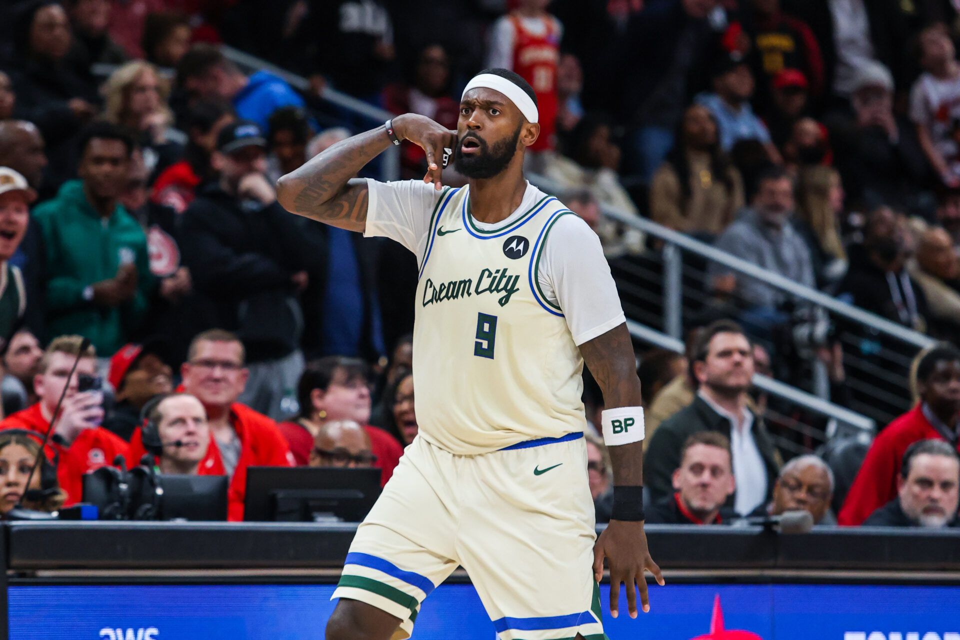 Milwaukee Bucks forward Bobby Portis (9) celebrates a three point shot against the Atlanta Hawks during the fourth quarter at State Farm Arena.