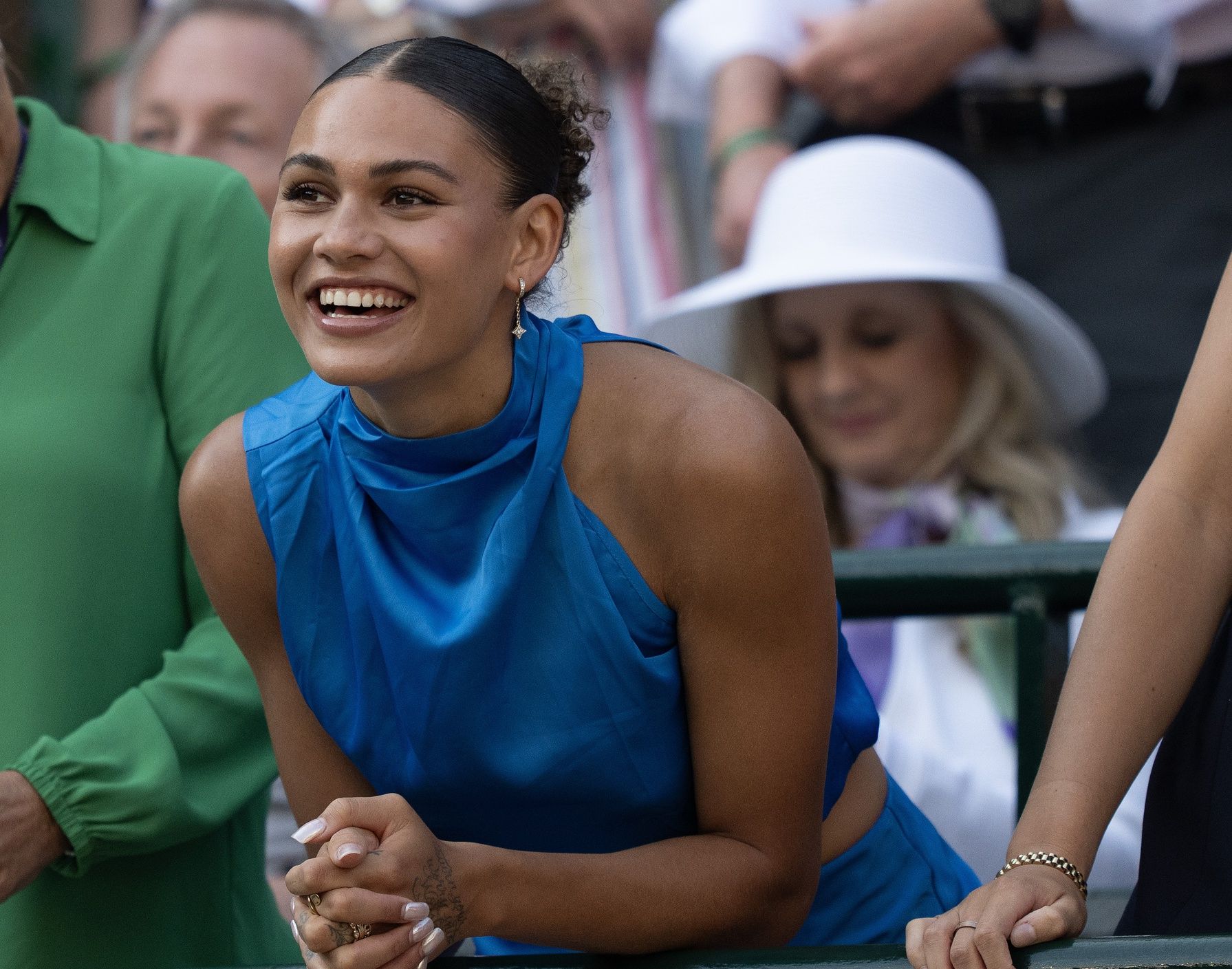 Trinity Rodman reacts to Ben Shelton of the United States winning his match against Lorenzo Sonego of Italy on day eight at All England Lawn Tennis and Croquet Club.