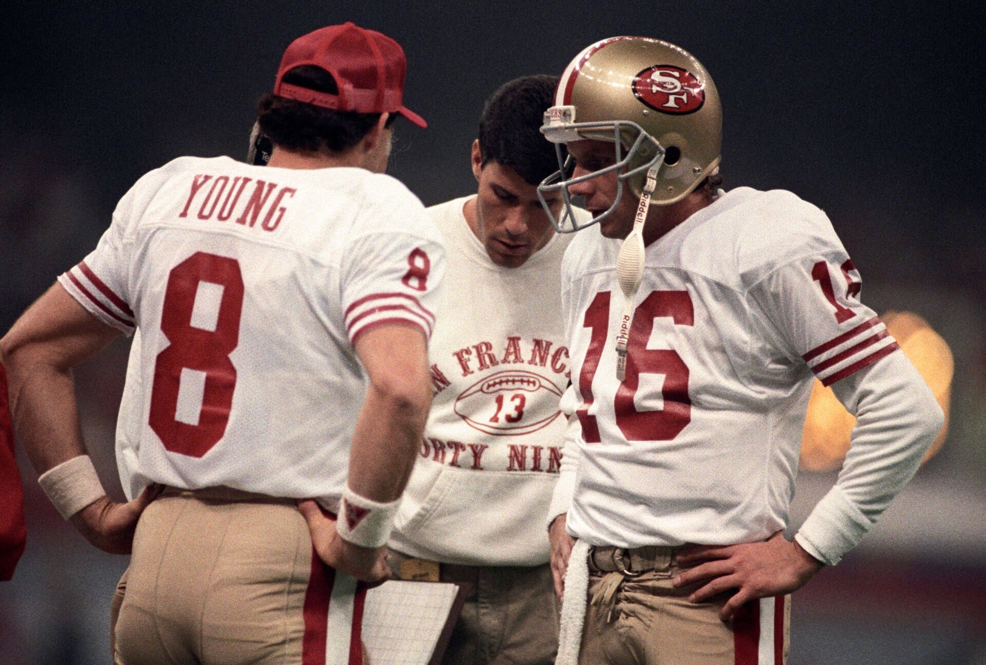 FILE PHOTO; San Francisco 49ers quarterback Steve Young (8) and quarterback Joe Montana (16) on the sidelines against the Denver Broncos during Super Bowl XXIV at the Superdome. The 49ers defeated the Broncos 55-10.