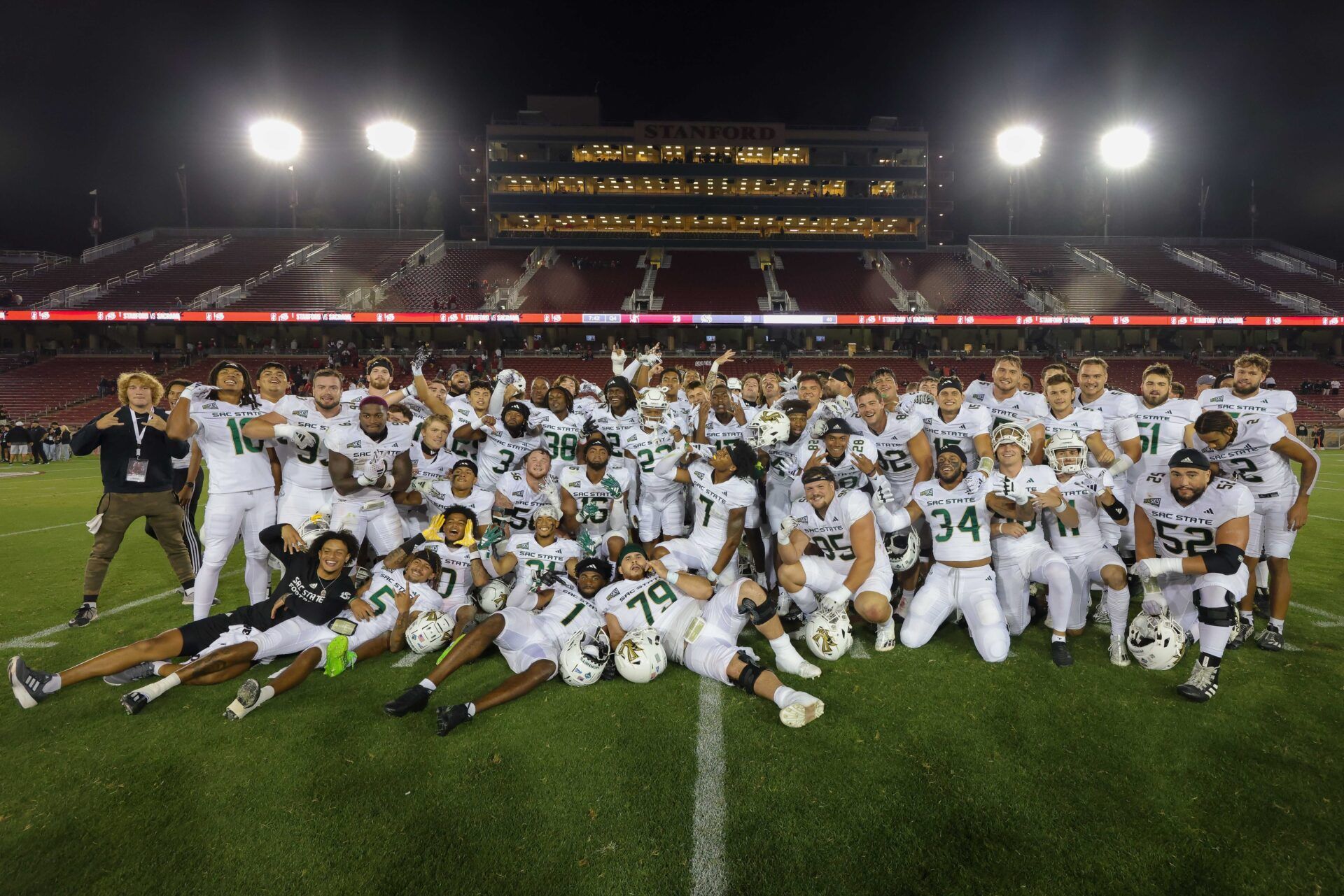 Sacramento State Hornets players pose for a photo after the game against the Stanford Cardinal at Stanford Stadium.