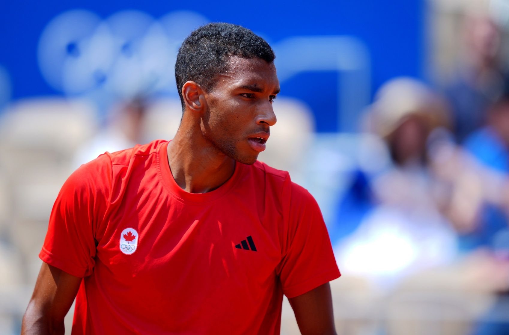 Felix Auger-Aliassime (CAN) reacts in a match against Carlos Alcaraz (not pictured) during the Paris 2024 Olympic Summer Games at Stade Roland Garros.