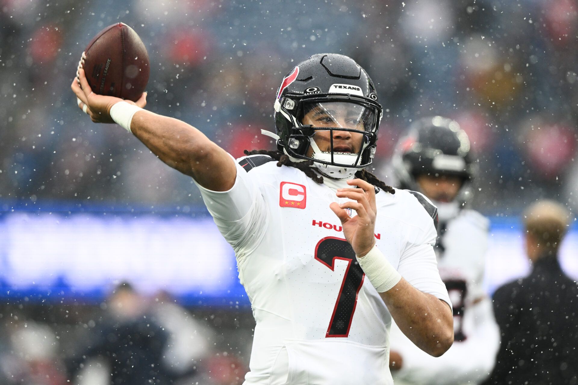 Houston Texans quarterback C.J. Stroud (7) warms up before an AFC Divisional Round game against the New England Patriots at Gillette Stadium.