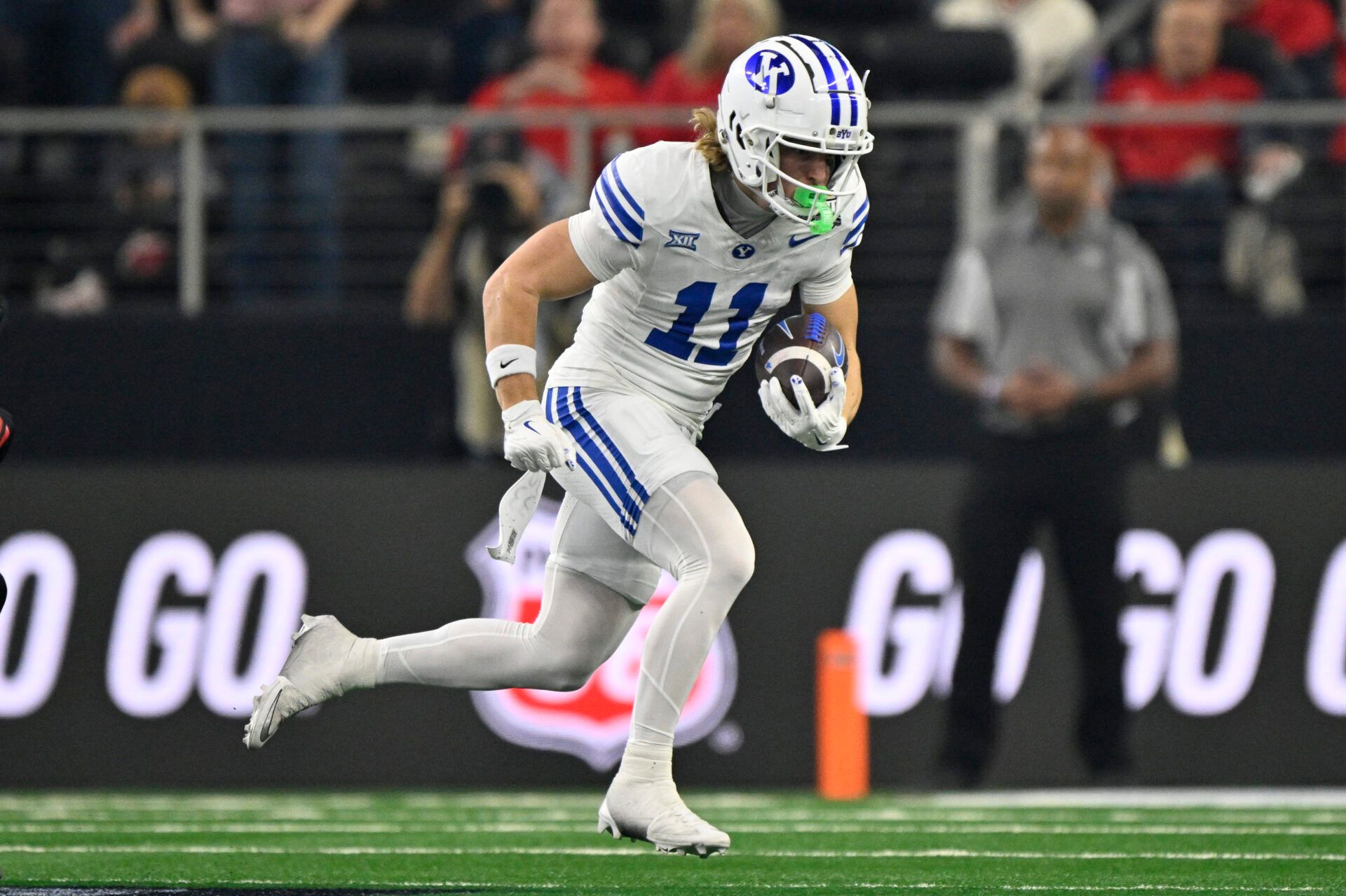 BYU Cougars wide receiver Parker Kingston (11) runs with the ball during the first half against the Texas Tech Red Raiders at AT&T Stadium.