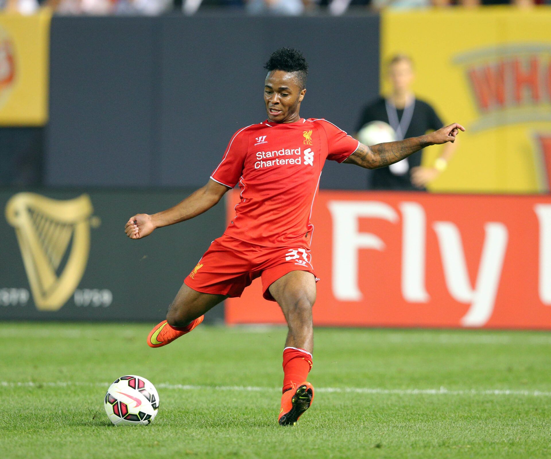 Liverpool FC forward Raheem Sterling (31) controls the ball against Manchester City FC during the second half of a game at Yankee Stadium.