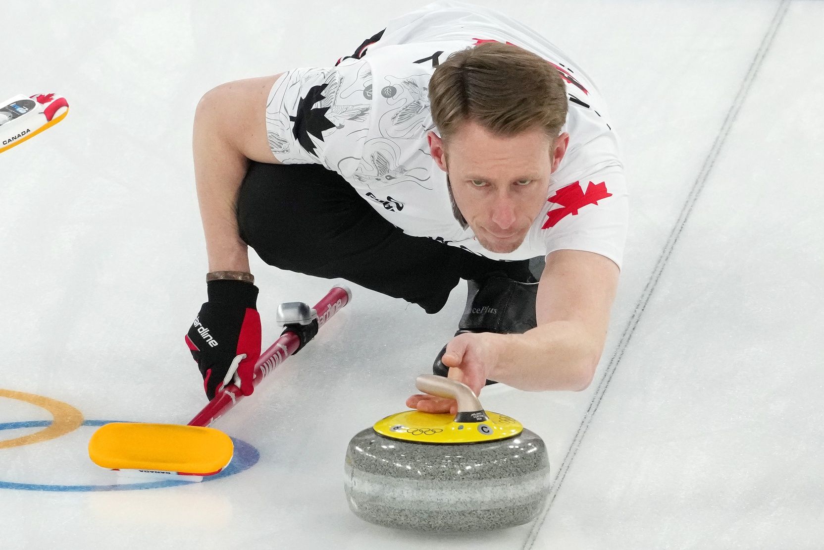 Marc Kennedy of Canada during a men's curling round robin game during the Milano Cortina 2026 Olympic Winter Games at Cortina Curling Olympic Stadium.