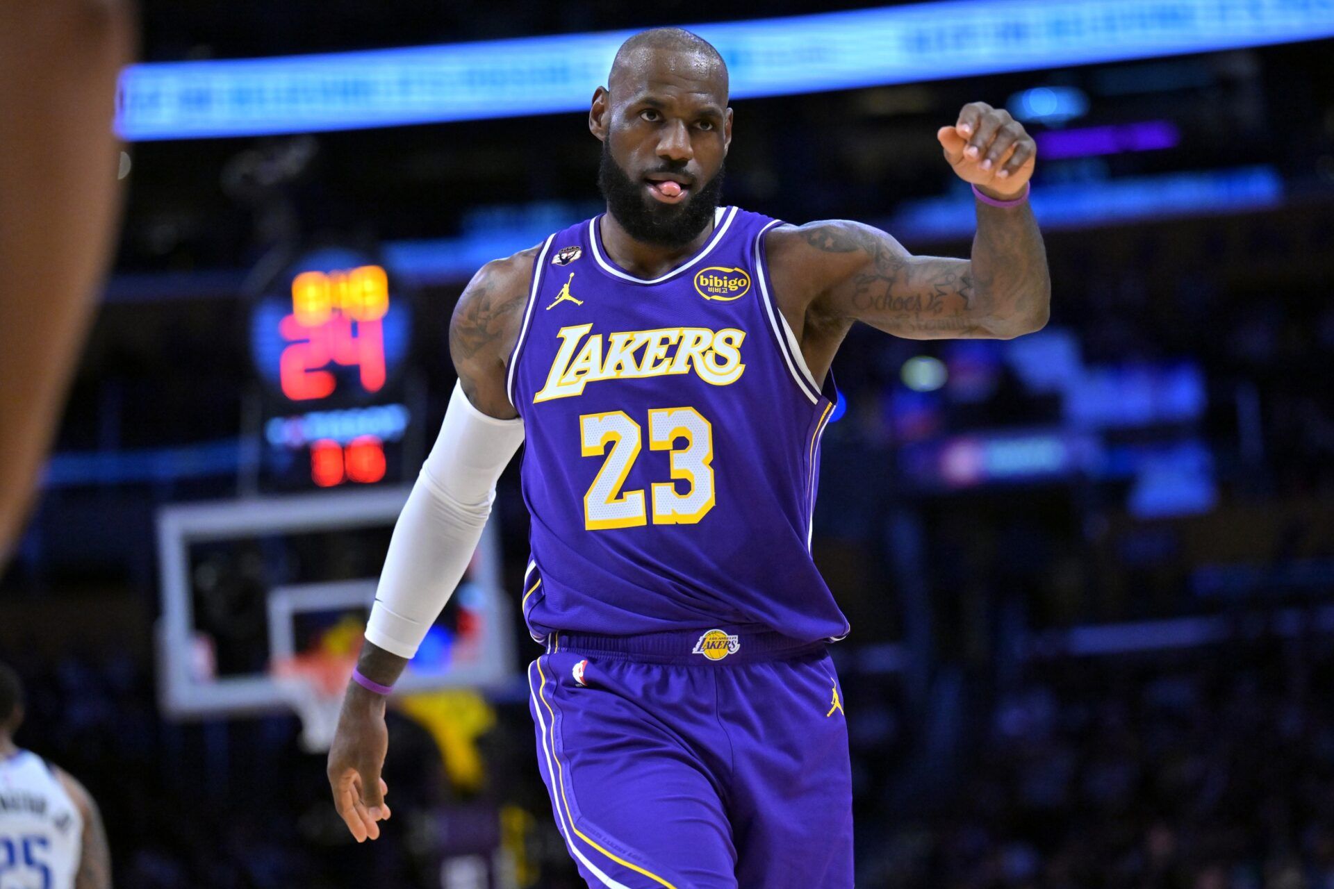 Los Angeles Lakers forward LeBron James (23) reacts on the court after a three-point basket in the first half against the Dallas Mavericks at Crypto.com Arena.