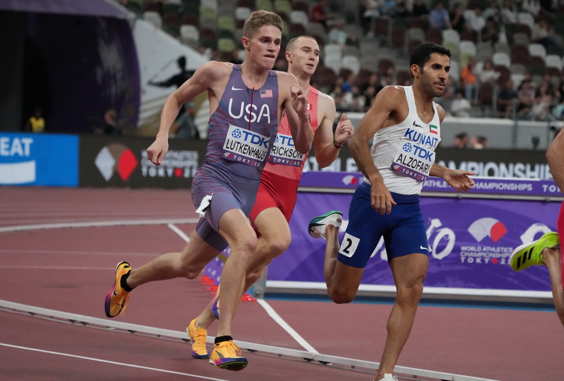 Cooper Lutkenhaus (USA) and Ebrahim Alzofairi (KUW) run in the men’s 800 meters qualifying during the World Athletics Championships at National Stadium.