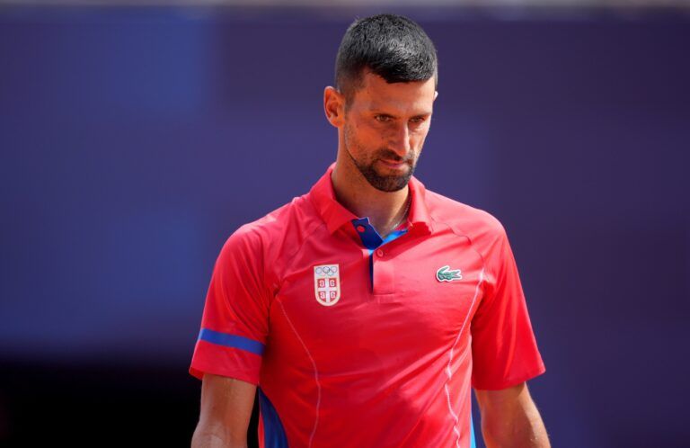 Novak Djokovic (SRB) reacts after a point in the men’s singles gold medal match against Carlos Alcaraz (not pictured) during the Paris 2024 Olympic Summer Games at Stade Roland Garros.