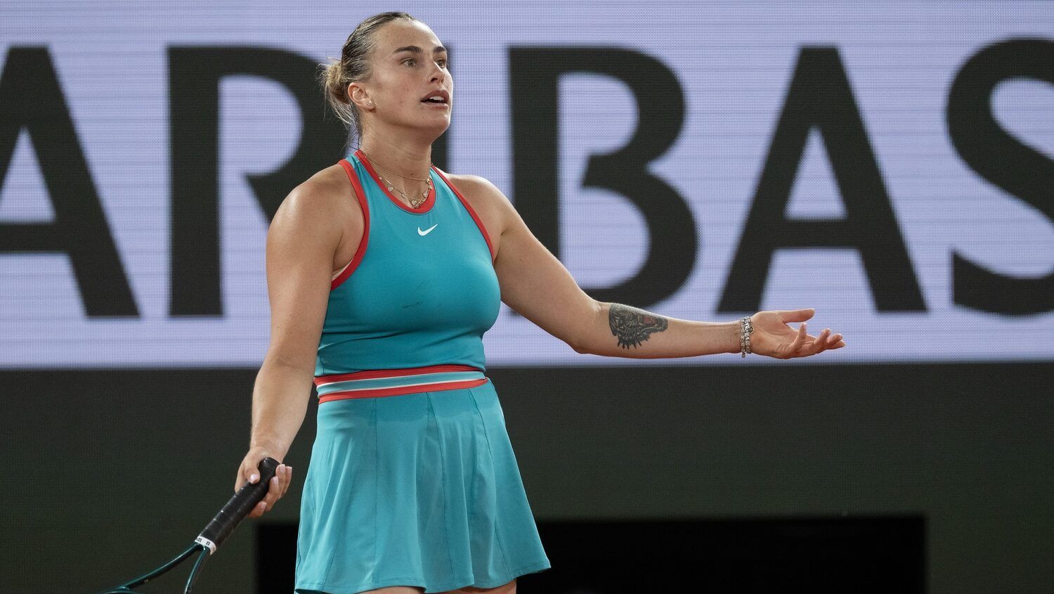 Aryna Sabalenka reacts to a point during her match against Iga Swiatek of Poland on day 12 at Roland Garros Stadium.