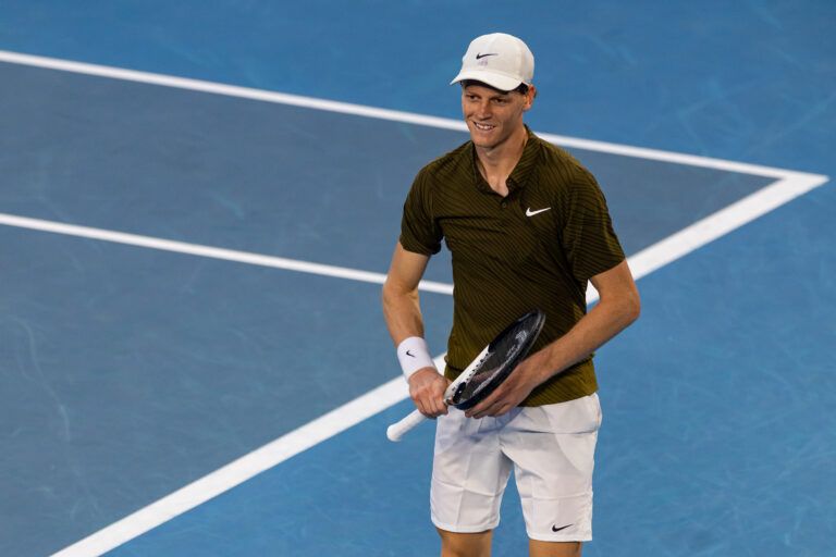 Jannik Sinner of Italy in action against Luciano Darderi of Italy in the fourth round of the mens singles at the Australian Open at Margaret Court Arena in Melbourne Park.