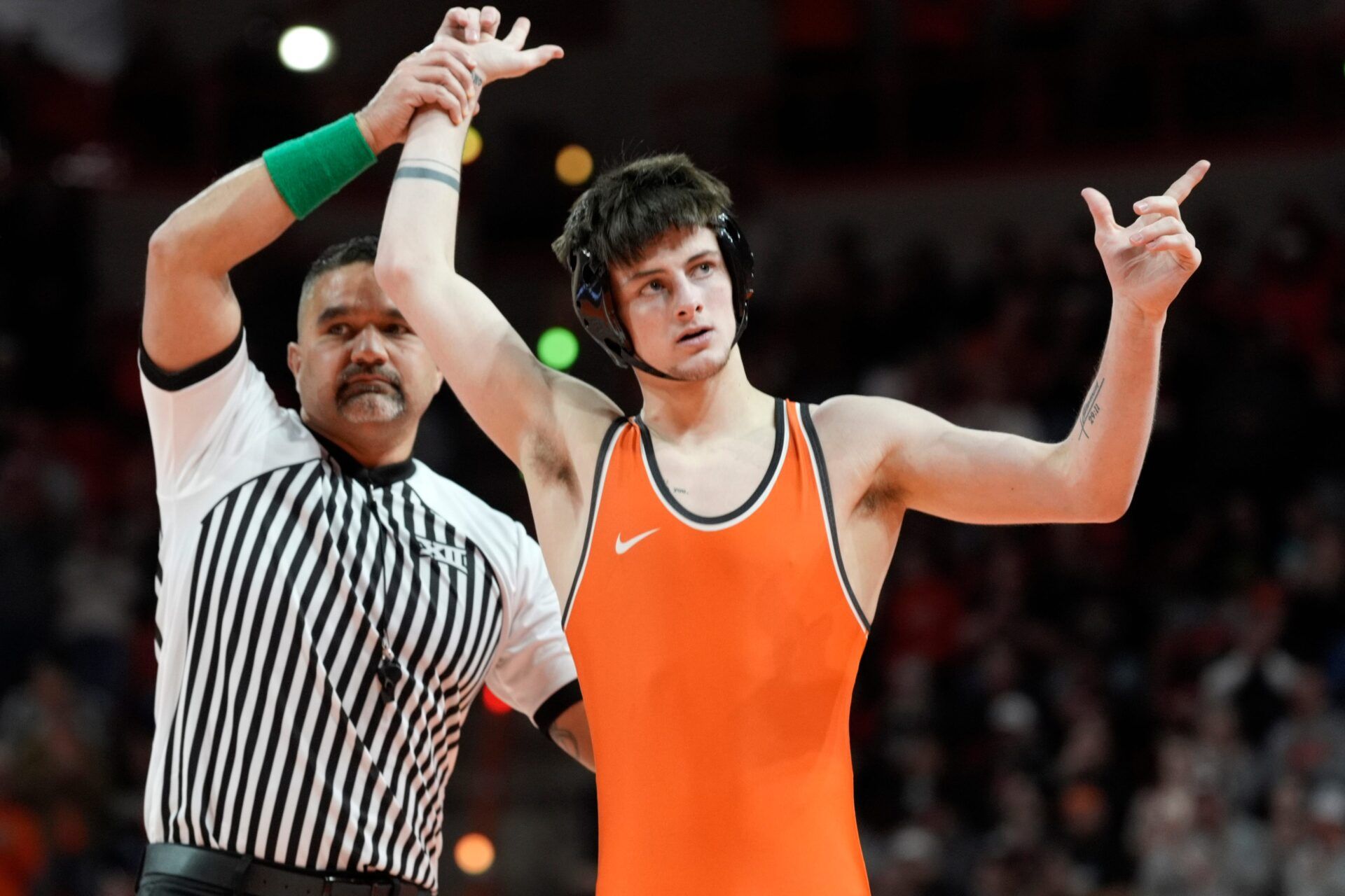 Oklahoma State's Jax Forrest celebrates after wrestleing Iowa State's Osmany Diversent in the 133-pound bout of a college wrestling dual between the Oklahoma State Cowboys and the Iowa State Cyclones at Gallagher-Iba Arena in Stillwater, Okla., Sunday, Feb. 1, 2026.