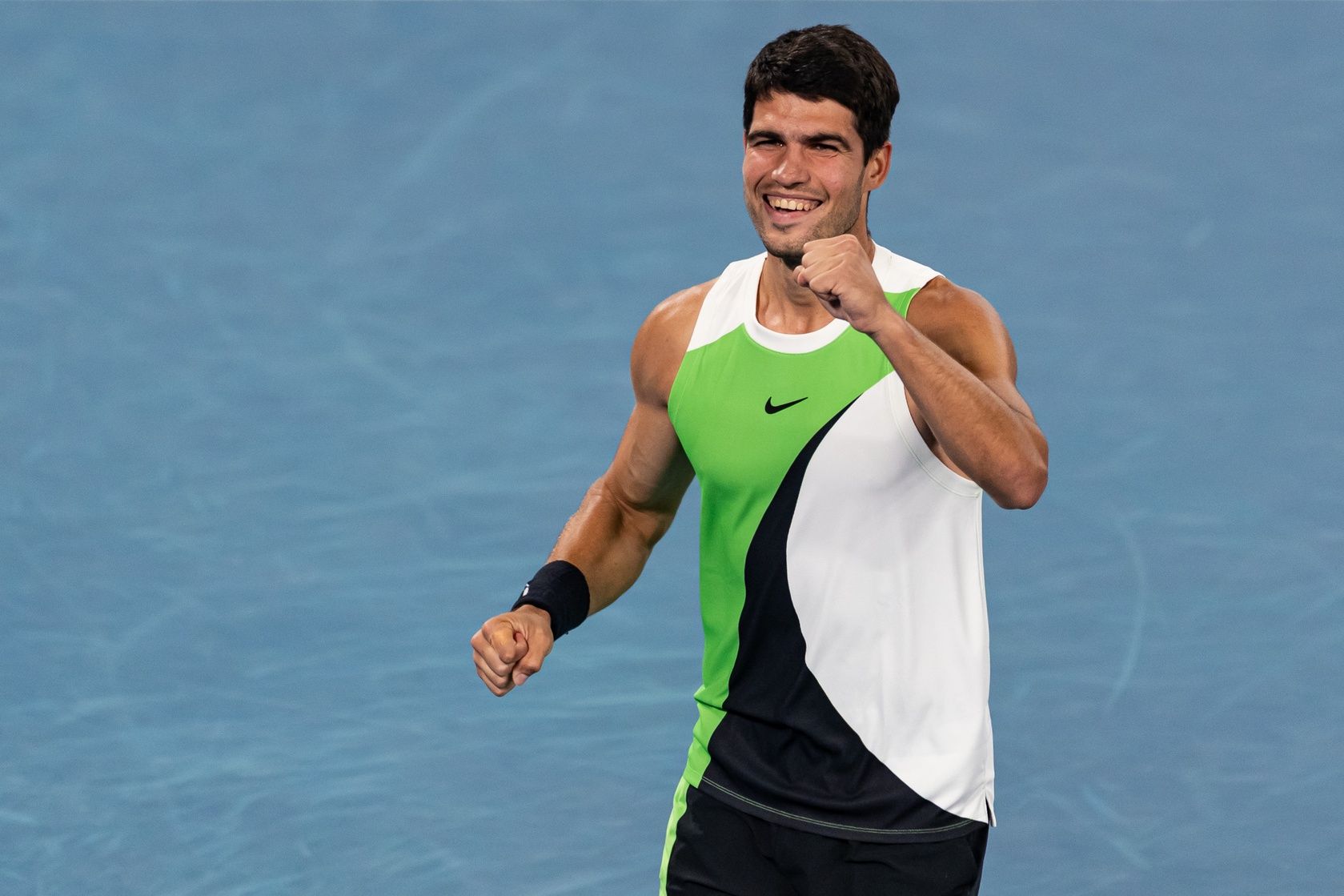 Carlos Alcaraz of Spain celebrates his victory over Novak Djokovic of Serbia in the final of the mens singles at the Australian Open at Rod Laver Arena in Melbourne Park.