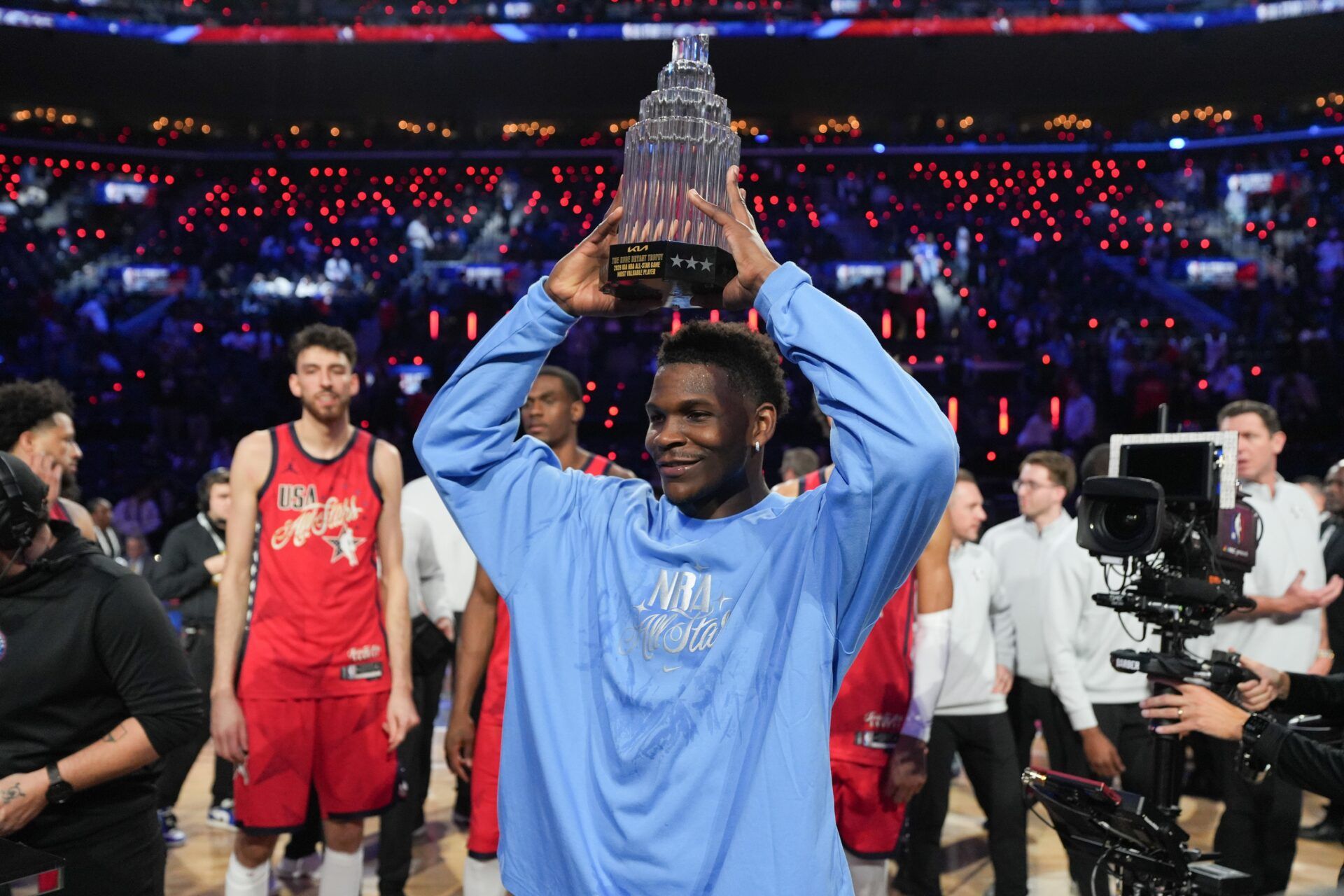 Team USA Stars guard Anthony Edwards (5) of the Minnesota Timberwolves poses with the MVP trophy after the 75th NBA All Star Game at Intuit Dome.