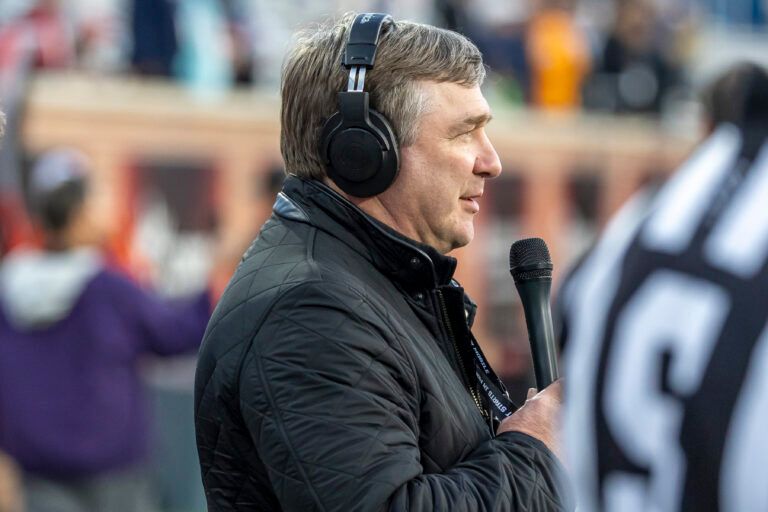 Georgia head football coach Kirby Smart visits the field during American Senior Bowl practice at Hancock Whitney Stadium.