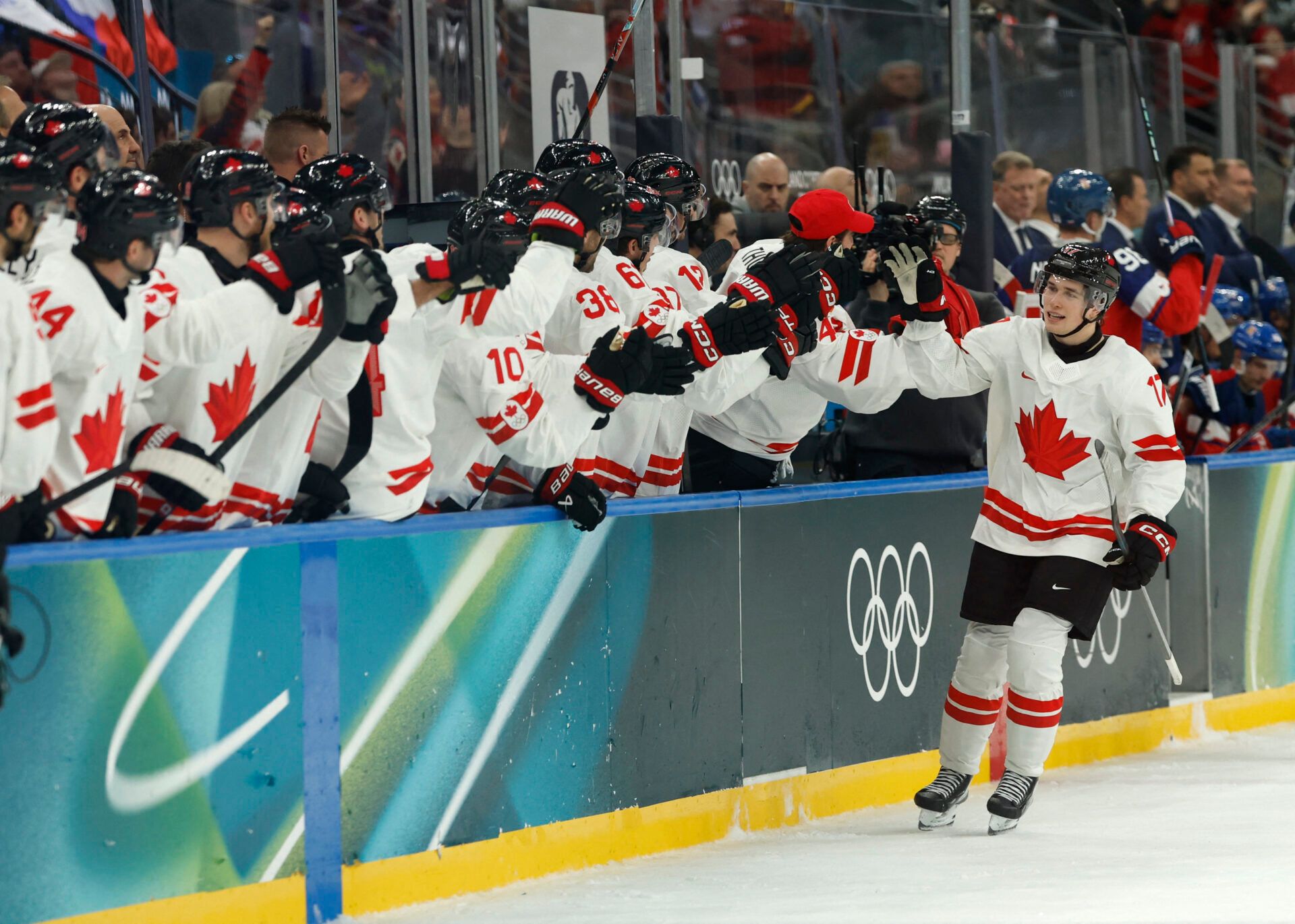 Macklin Celebrini of Canada celebrates scoring their first goal against Czechia  in a men's ice hockey group A match during the Milano Cortina 2026 Olympic Winter Games at Milano Santagiulia Ice Hockey Arena.