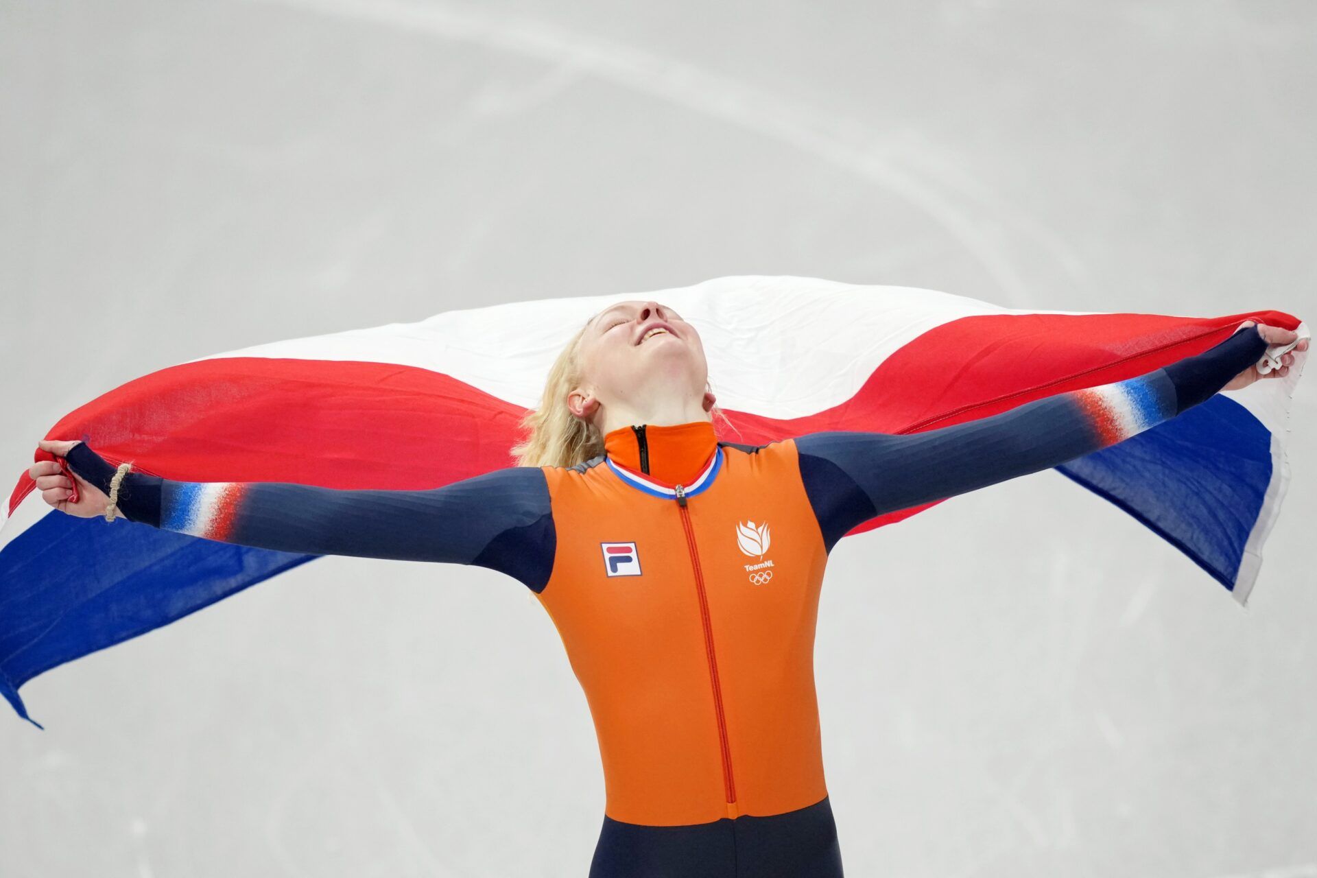 Gold medalist Xandra Velzeboer of the Netherlands celebrates after the women's 1000m during the Milano Cortina 2026 Olympic Winter Games at Milano Ice Skating Arena.