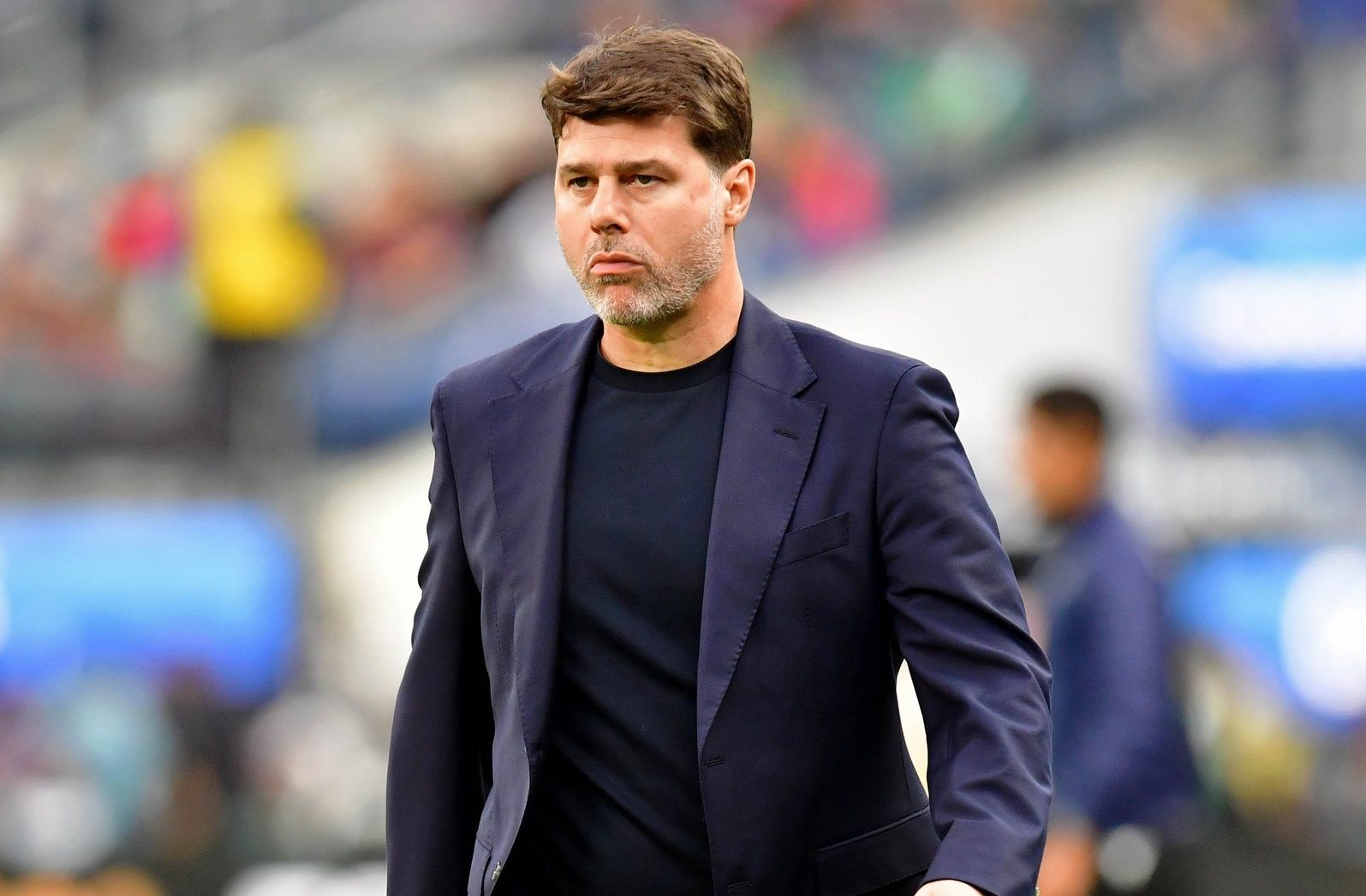 United States of America head coach Mauricio Pochettino walks off the field after the first half of a Concacaf Nations League semifinal match at SoFi Stadium.