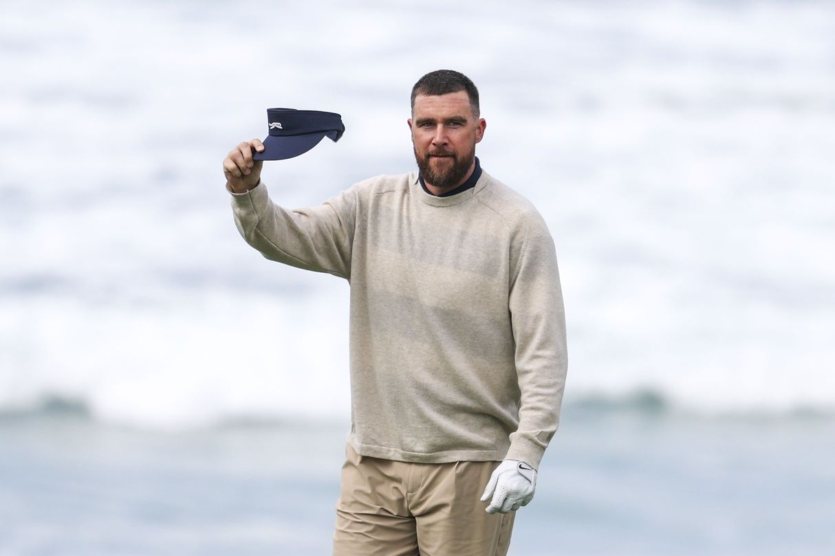 Kansas City Chiefs tight end Travis Kelce acknowledges the crowd on the 10th hole during the second round of the AT&T Pebble Beach Pro-Am golf tournament at Pebble Beach Golf Links.
