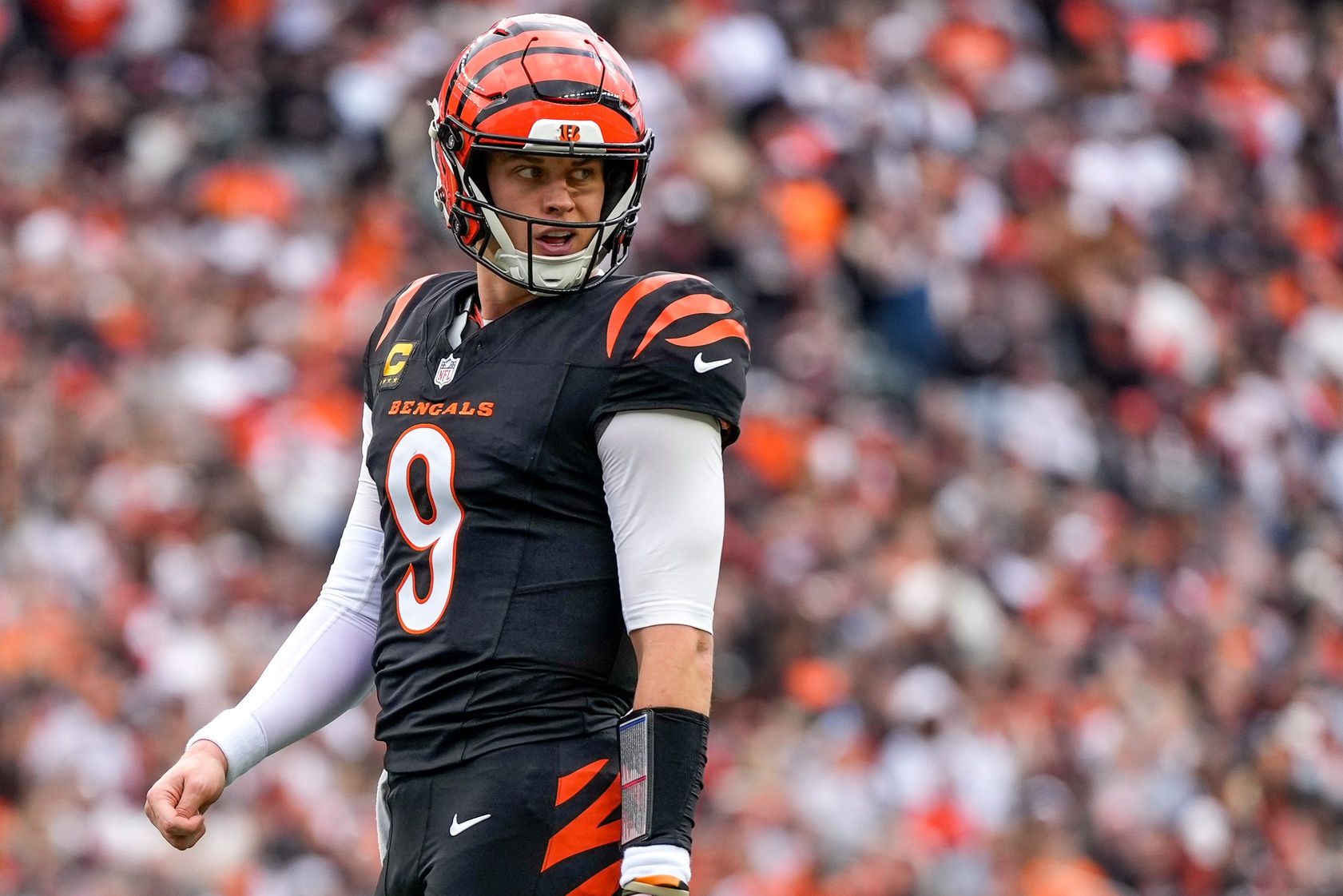 Cincinnati Bengals quarterback Joe Burrow (9) looks back to the sideline before a goal line play in the first quarter of the NFL Week 17 game between the Cincinnati Bengals and the Arizona Cardinals at Paycor Stadium in Downtown Cincinnati on Sunday, Dec. 28, 2025. The Bengals led 23-7 at halftime.