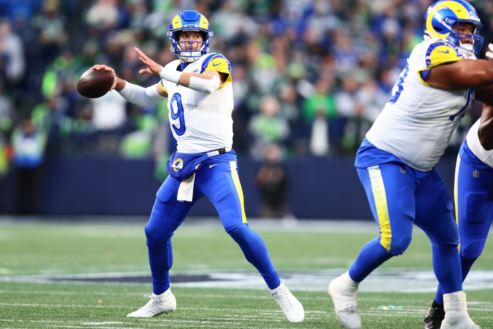 Los Angeles Rams quarterback Matthew Stafford (9) passes against the Seattle Seahawks during the first half in the 2026 NFC Championship Game at Lumen Field.