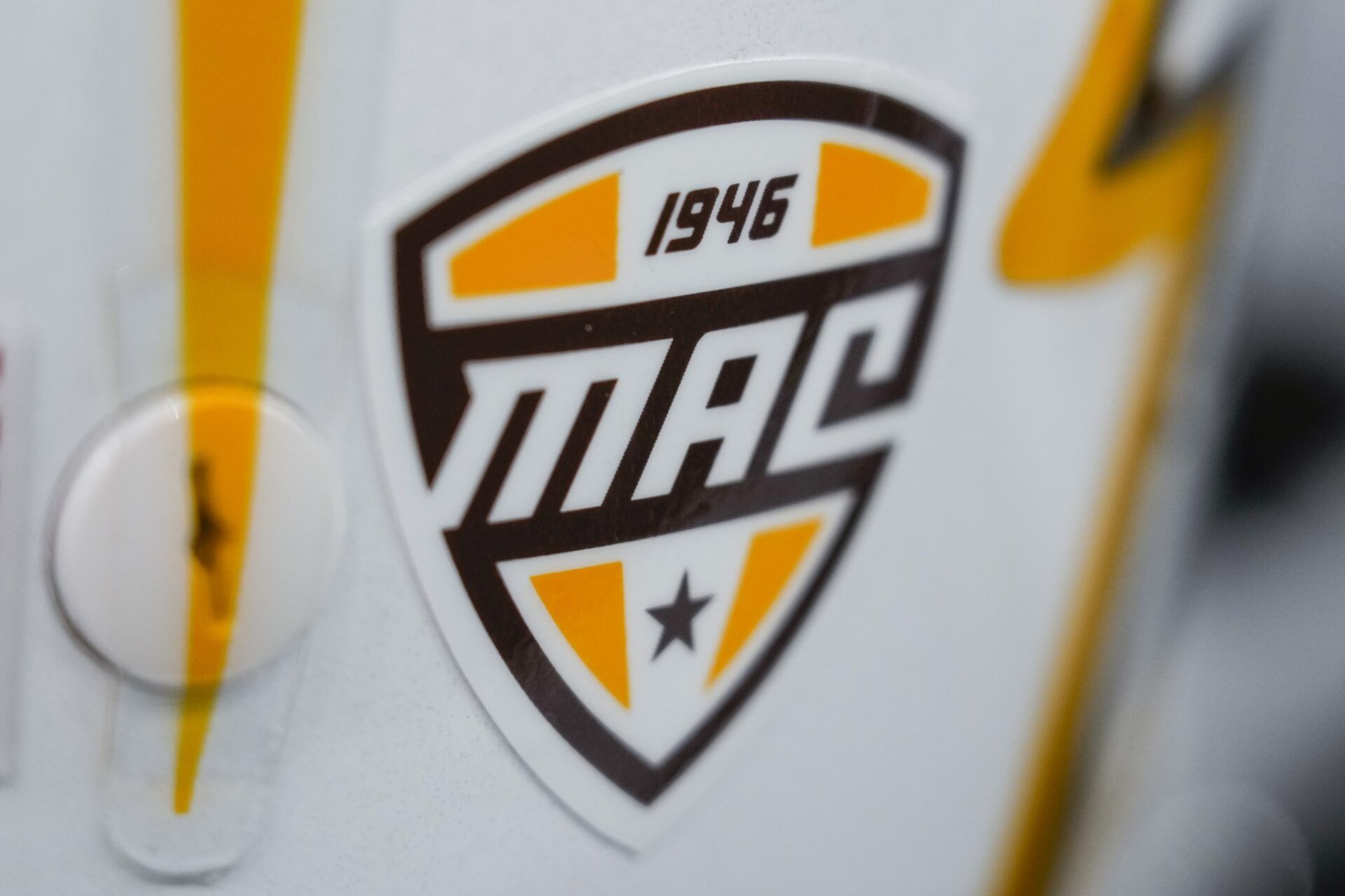 General view of the MAC Conference logo on a Western Michigan Broncos helmet during warmups prior to the game against the Wisconsin Badgers at Camp Randall Stadium.