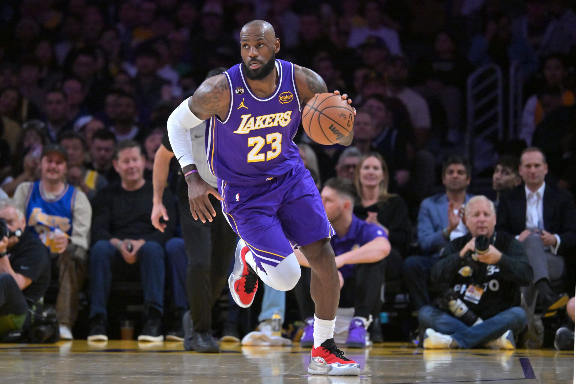 Los Angeles Lakers forward LeBron James (23) handles the ball in the first half against the Dallas Mavericks at Crypto.com Arena.