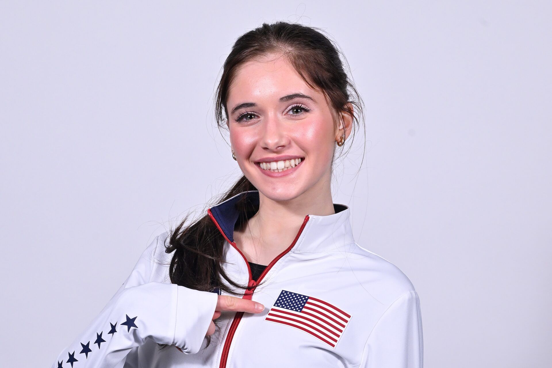 Isabeau Levito poses for a photo following the 2026 Milan Olympics figure skating team announcement show at Enterprise Center.