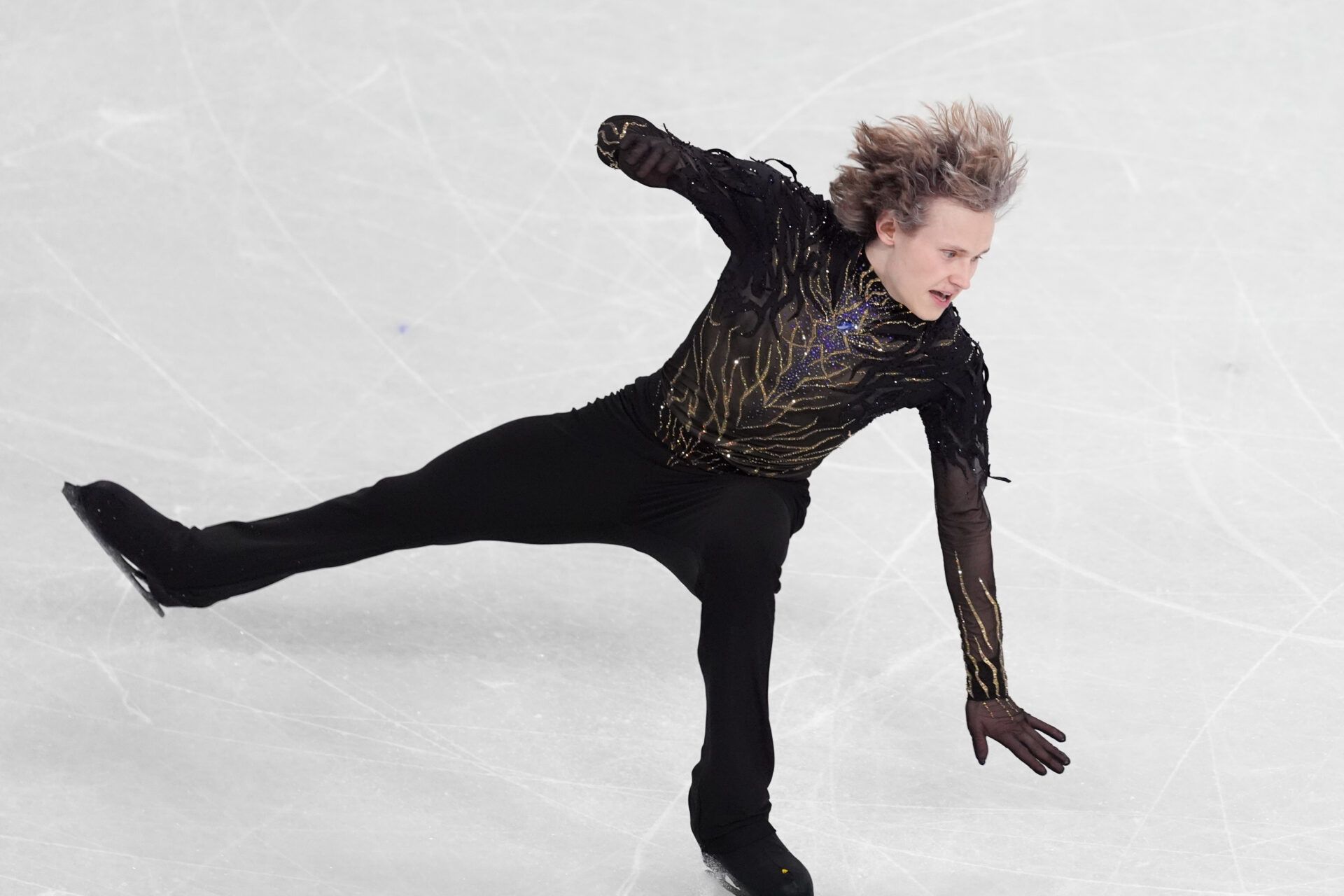 Ilia Malinin of the United States of America competes in the men’s singles free program during the Milano Cortina 2026 Olympic Winter Games at Milano Ice Skating Arena.