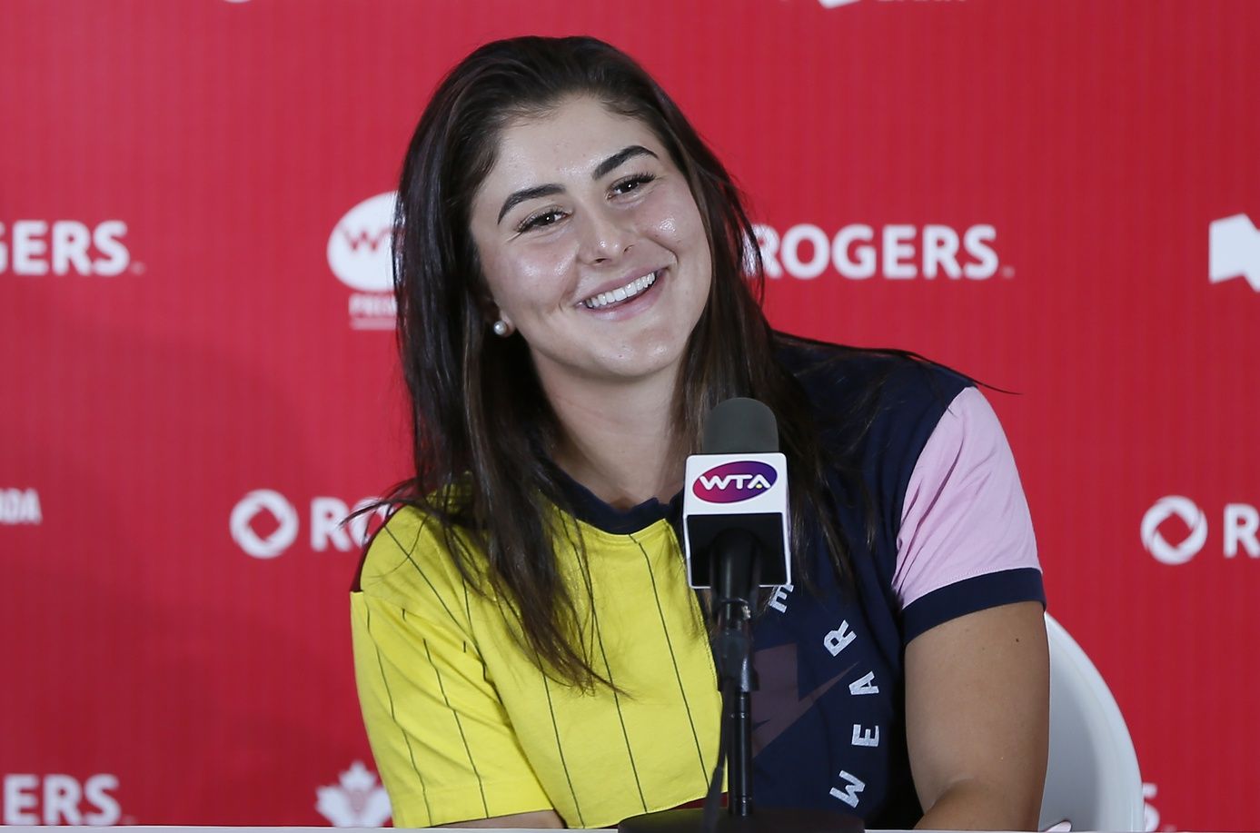 Bianca Andreescu (CAN) smiles during the media conference after defeating Serena Williams (not pictured) during the Rogers Cup tennis tournament at Aviva Centre.