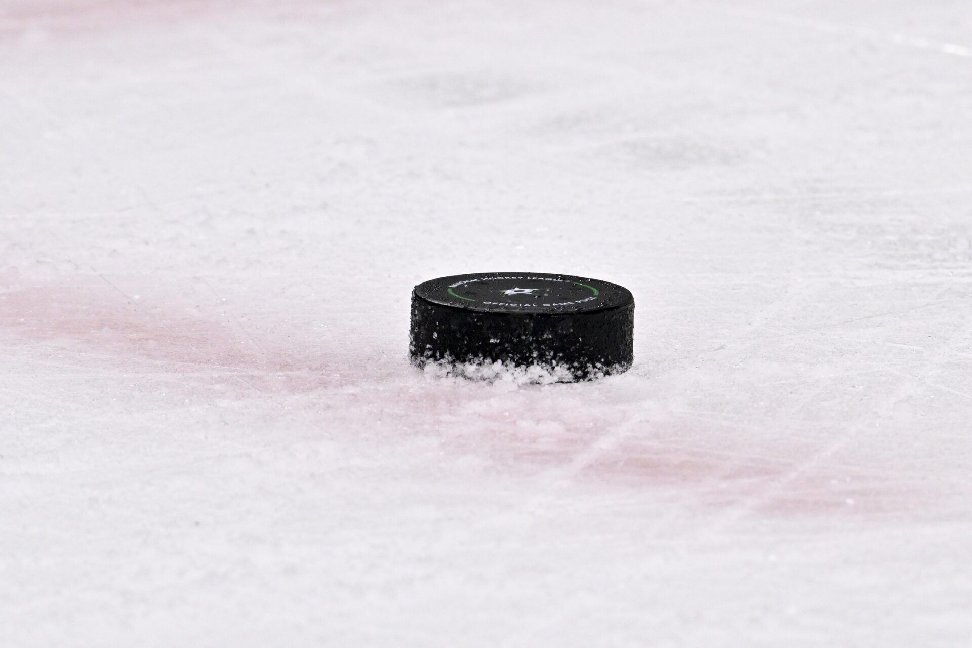 A view of an NHL puck with logo during the game between the Dallas Stars and the Winnipeg Jets in game three of the second round of the 2025 Stanley Cup Playoffs at American Airlines Center.