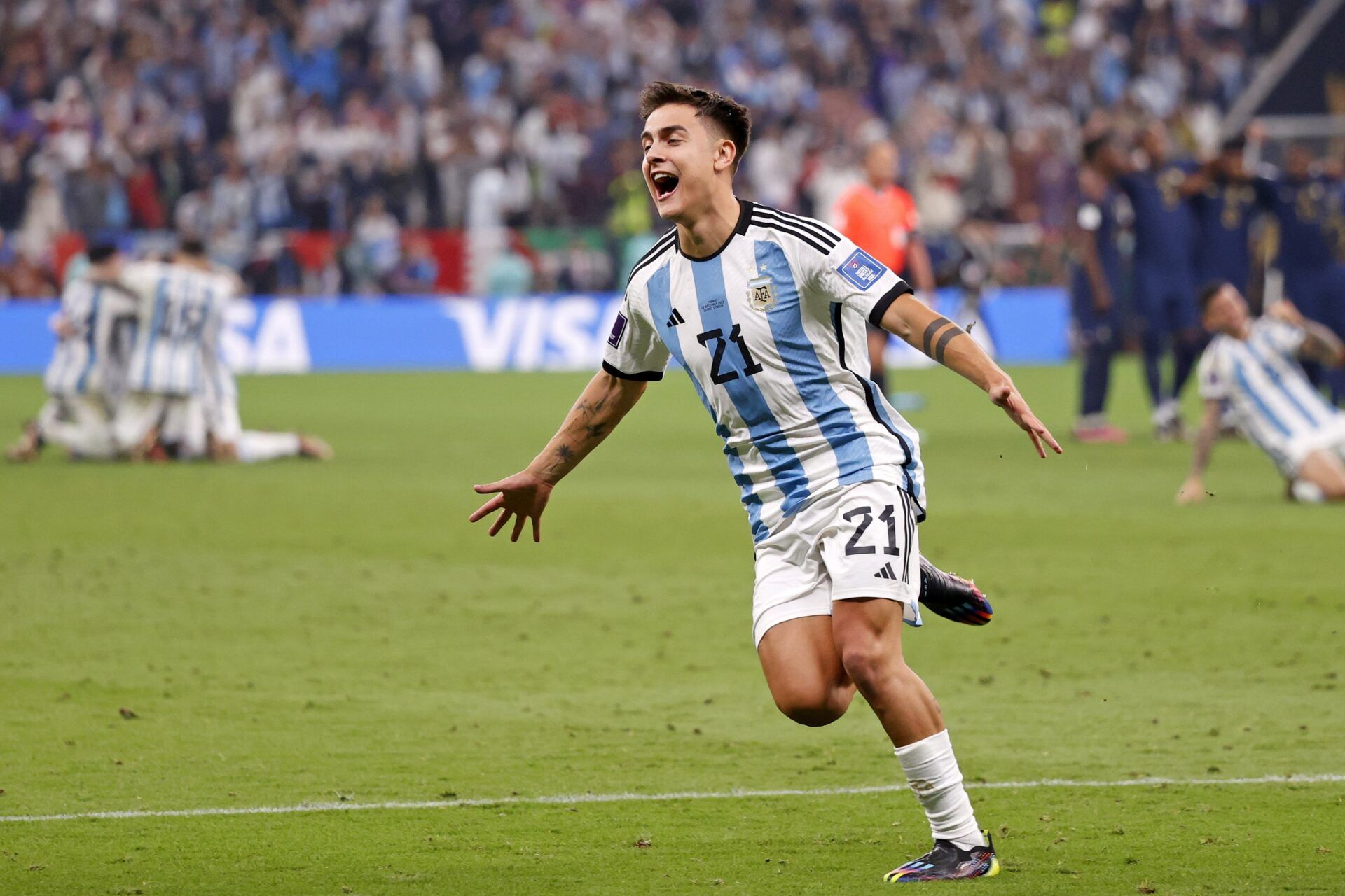 Argentina forward Paulo Dybala (21) celebrates after winning the 2022 World Cup final against France at Lusail Stadium.