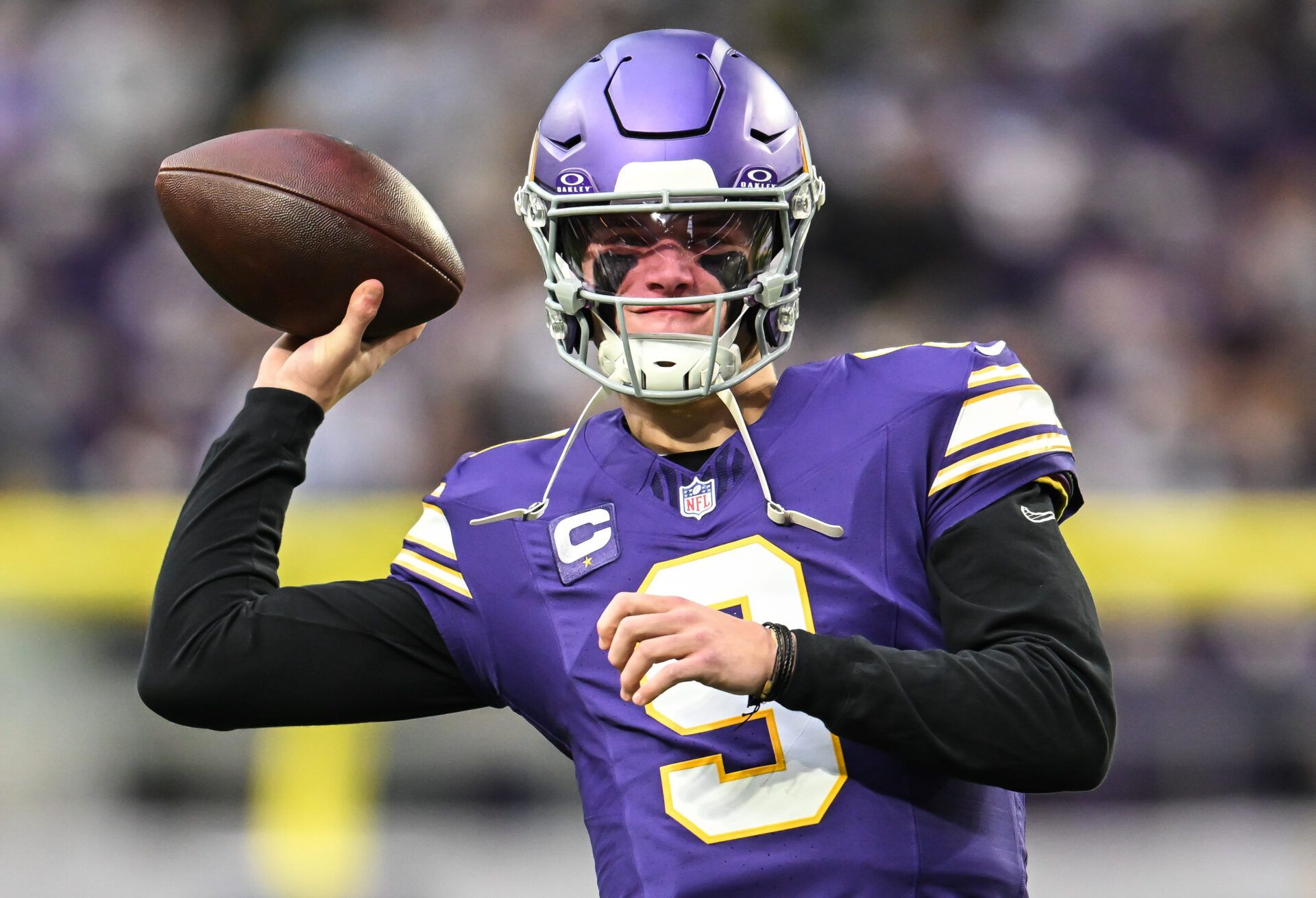 Minnesota Vikings quarterback J.J. McCarthy (9) warms up prior to the game against the Green Bay Packers at U.S. Bank Stadium.