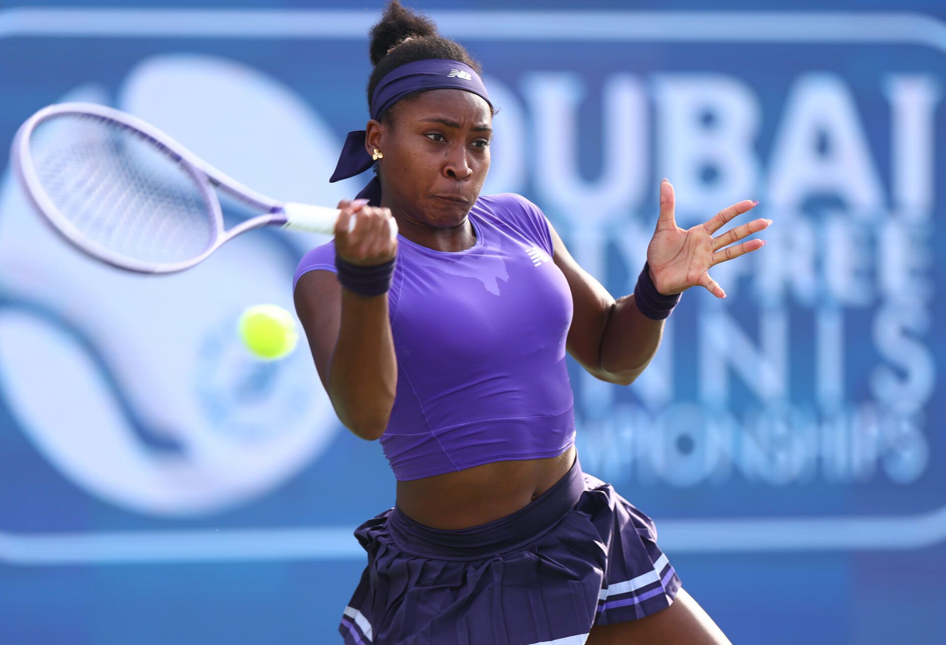 DUBAI, UNITED ARAB EMIRATES - FEBRUARY 17: Coco Gauff of United States plays a forehand against Anna Kalinskaya during her women's singles match on day three of the Dubai Duty Free Tennis Championships, part of the Hologic WTA Tour at Dubai Duty Free Tennis Stadium on February 17, 2026 in Dubai, United Arab Emirates. (Photo by Francois Nel/Getty Images)