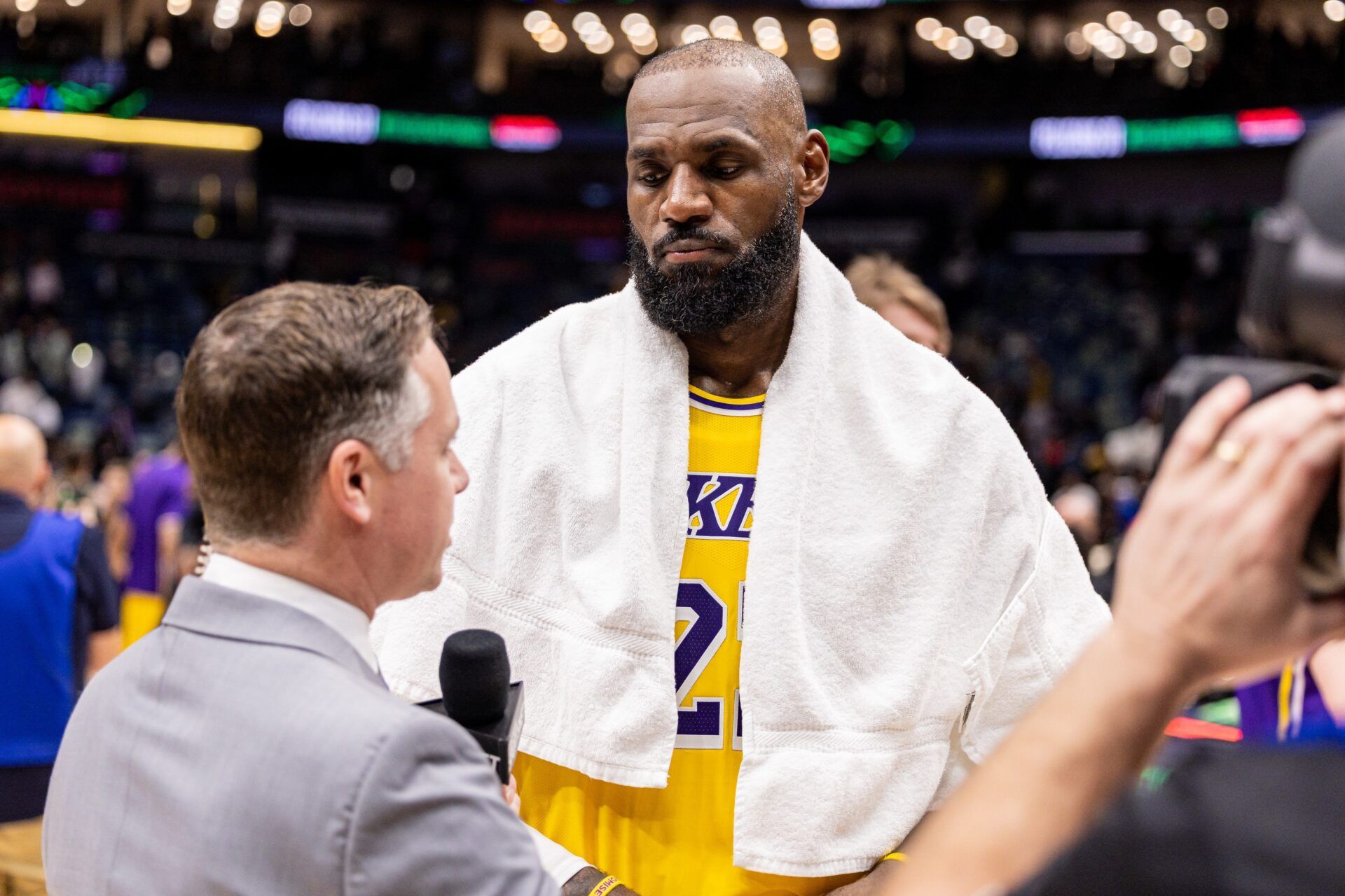 Los Angeles Lakers forward LeBron James (23) speaks to a reporter after the game against the New Orleans Pelicans at Smoothie King Center.