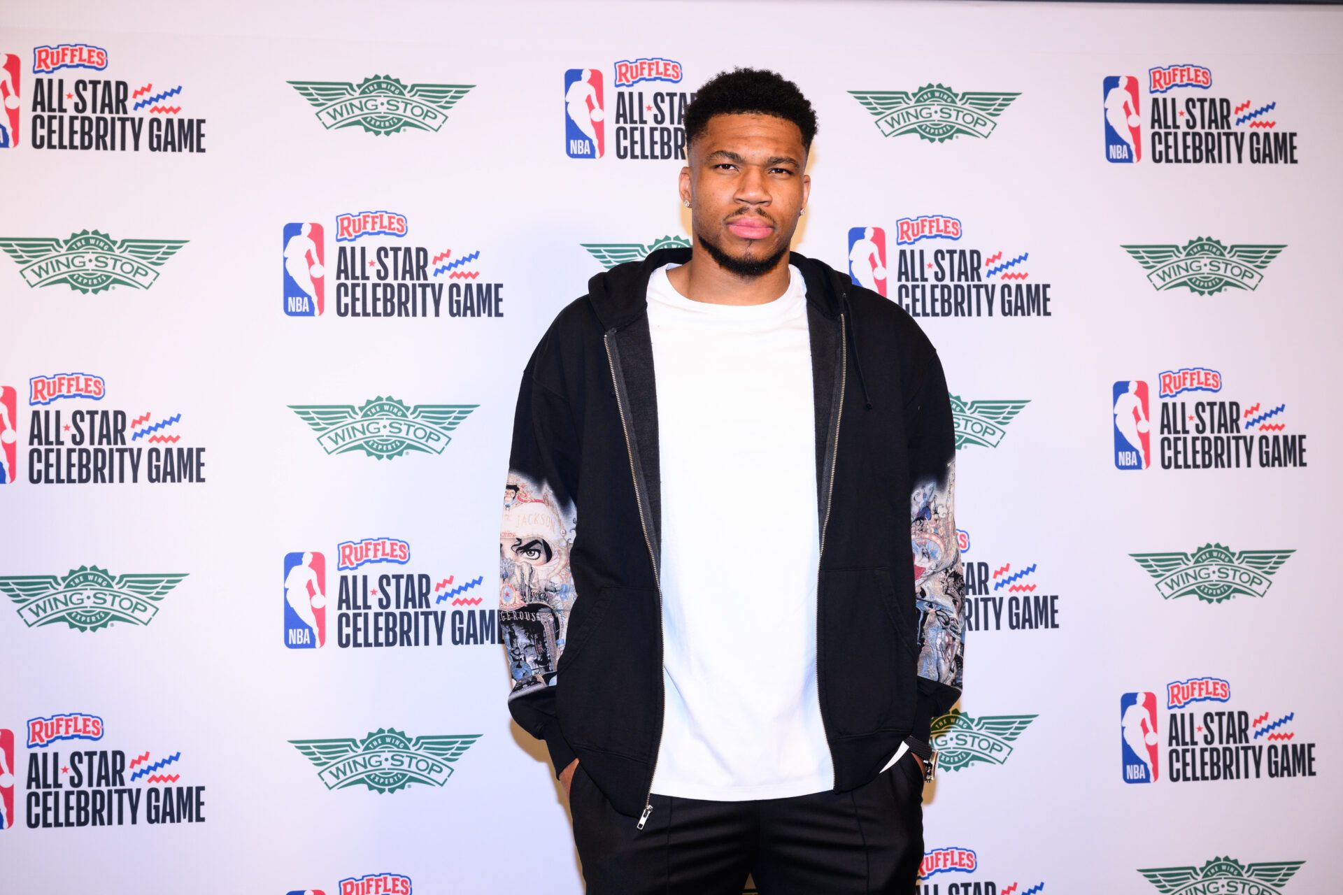 Giannis Antetokounmpo arrives on the green carpet prior to an NBA Celebrity All-Star basketball game at Kia Forum.