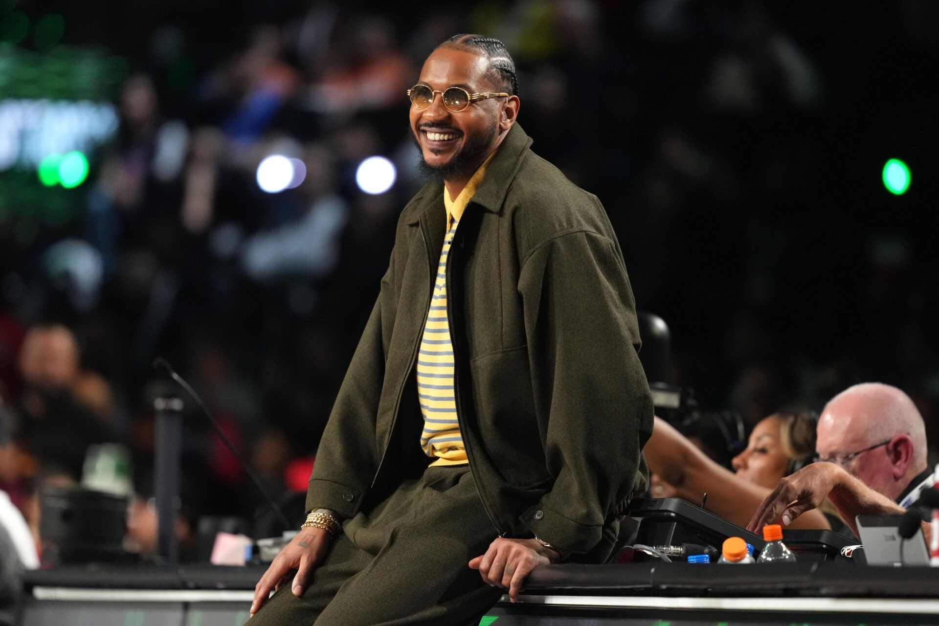 Team Melo honorary coach Carmelo Anthony looks on during an NBA All Star Rising Stars championship game at Intuit Dome.