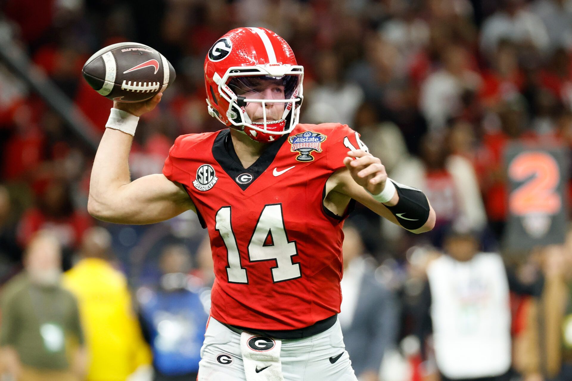 Georgia Bulldogs quarterback Gunner Stockton (14) passes the ball against the Mississippi Rebels in the second quarter during the 2026 Sugar Bowl and quarterfinal game of the College Football Playoff at Caesars Superdome.