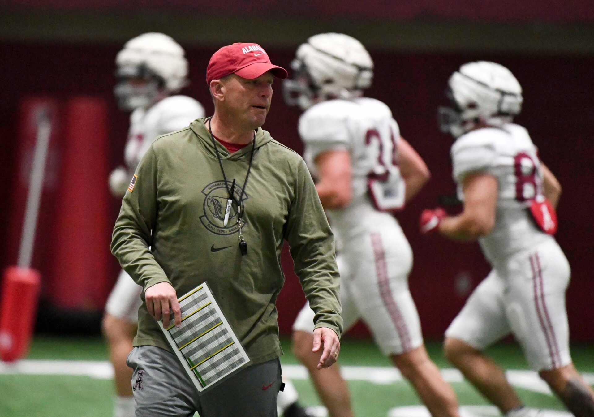 Alabama head coach Kalen DeBoer coaches his team during practice in the Hank Crisp Indoor Practice Facility at the University of Alabama.