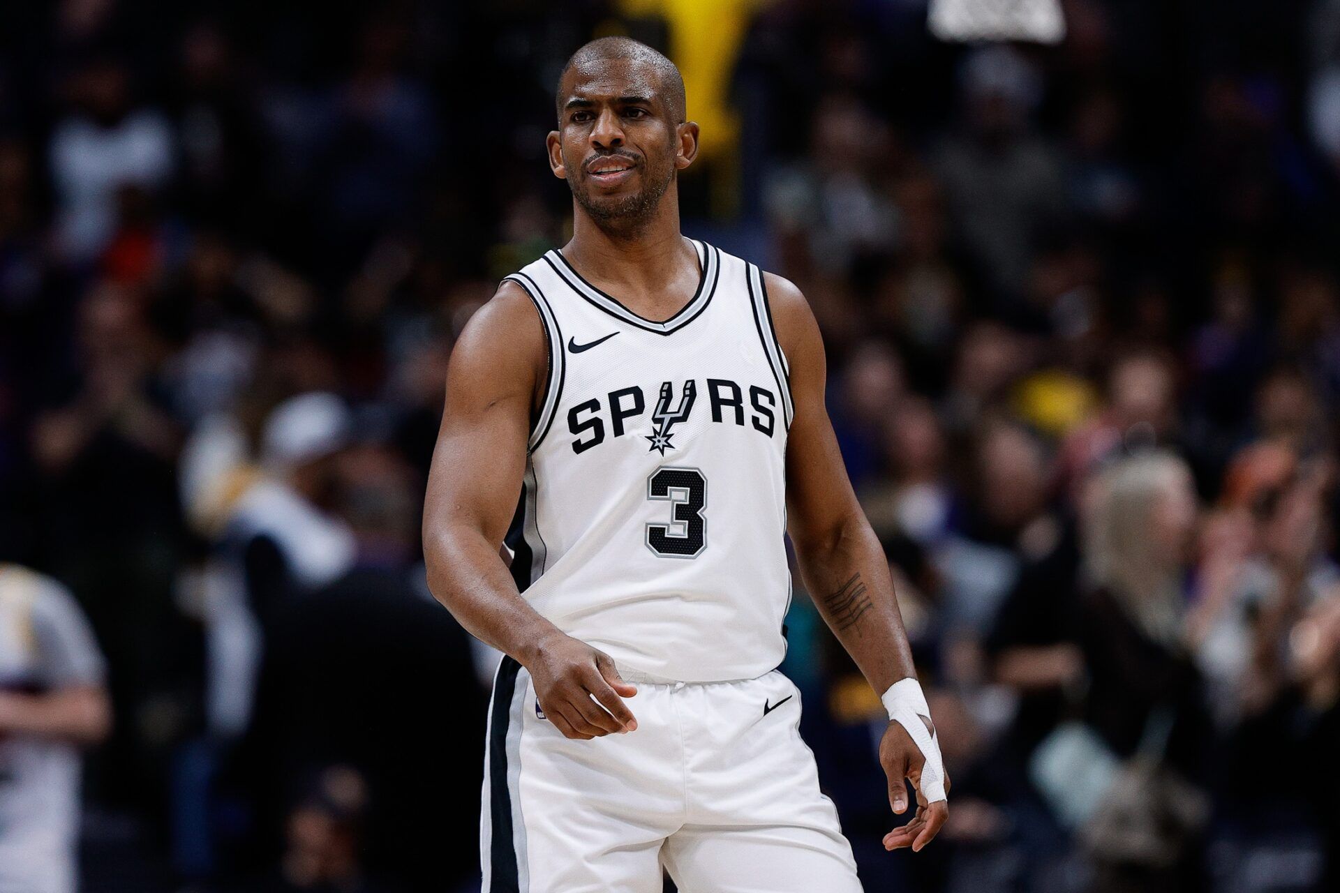 San Antonio Spurs guard Chris Paul (3) in the first quarter against the Denver Nuggets at Ball Arena.