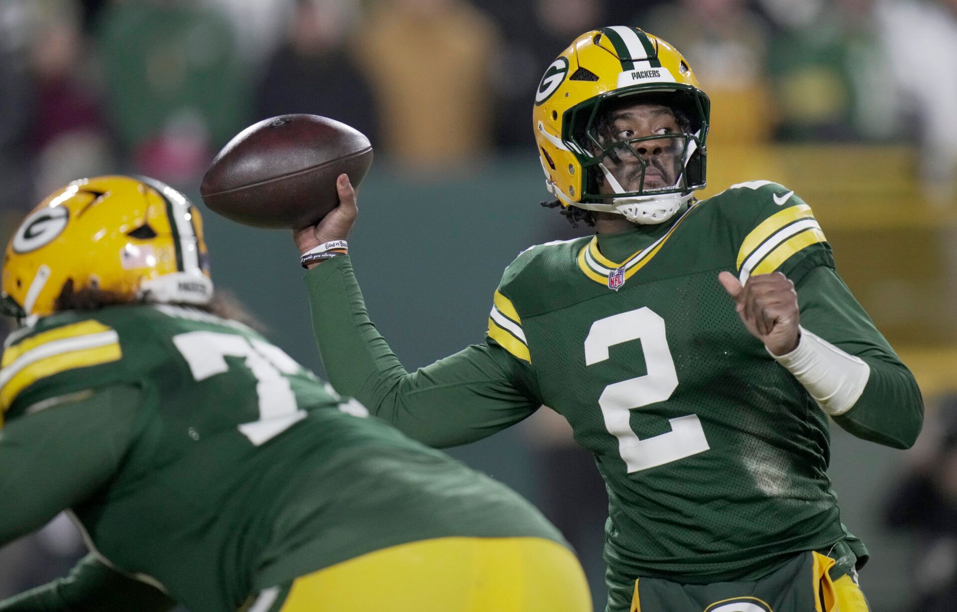Green Bay Packers quarterback Malik Willis (2) throws  during the third quarter of their game against the Baltimore Ravens at Lambeau Field.