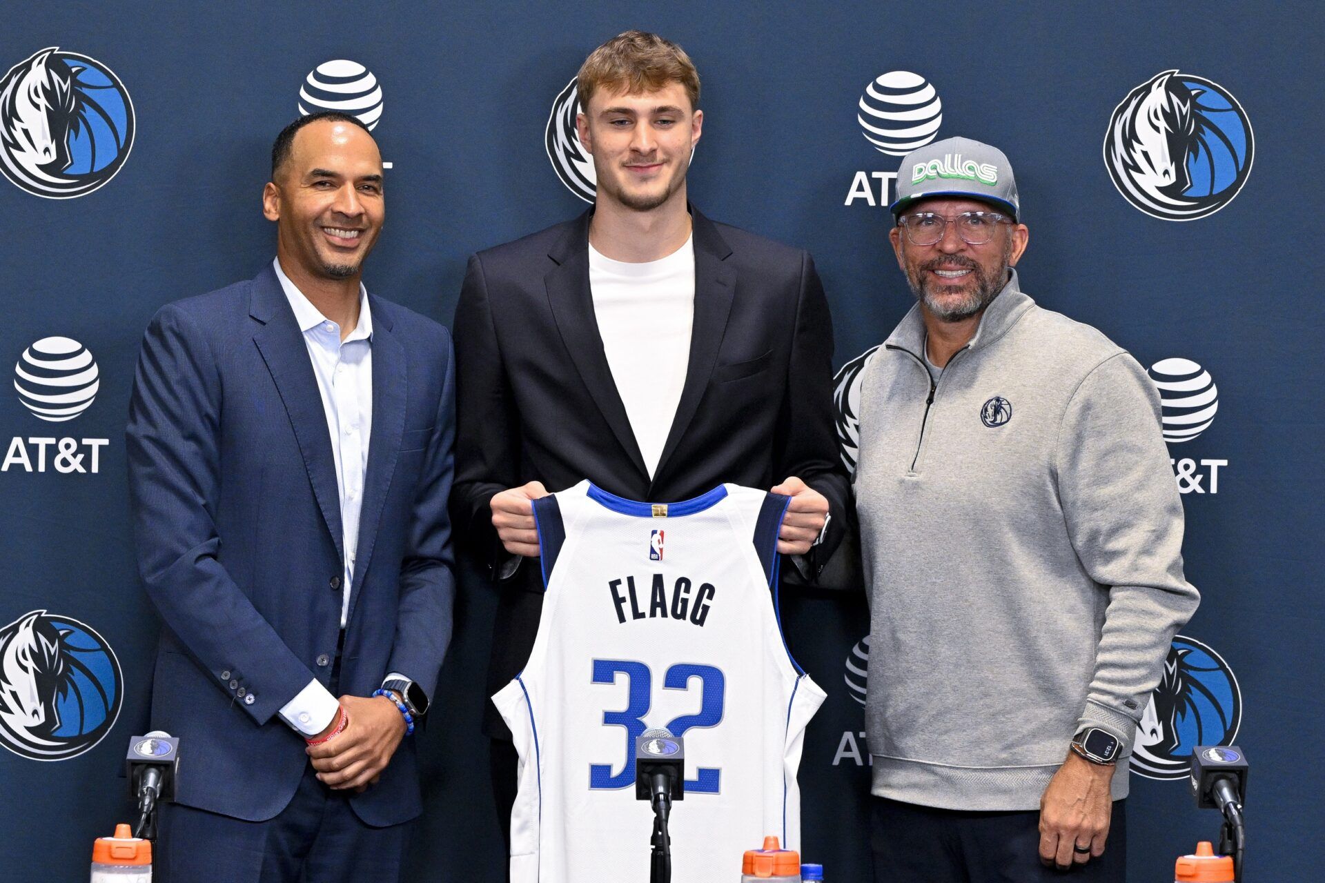 (from left) Dallas Mavericks general manager Nico Harrison and Mavericks first overall pick Cooper Flagg and head coach Jason Kidd pose for a photo at the Dallas Mavericks Practice Facility.