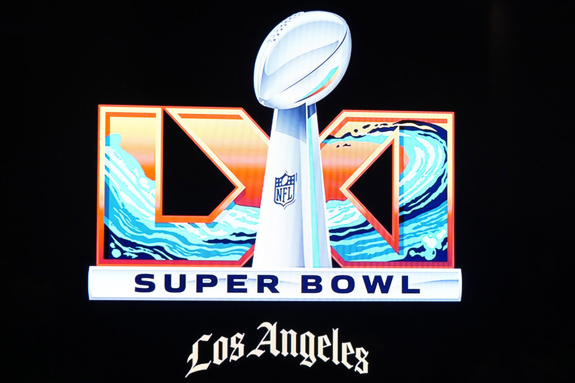 The Super Bowl 61 (LXI) logo at the Super Bowl LX host committee handoff press conference at Moscone Center.