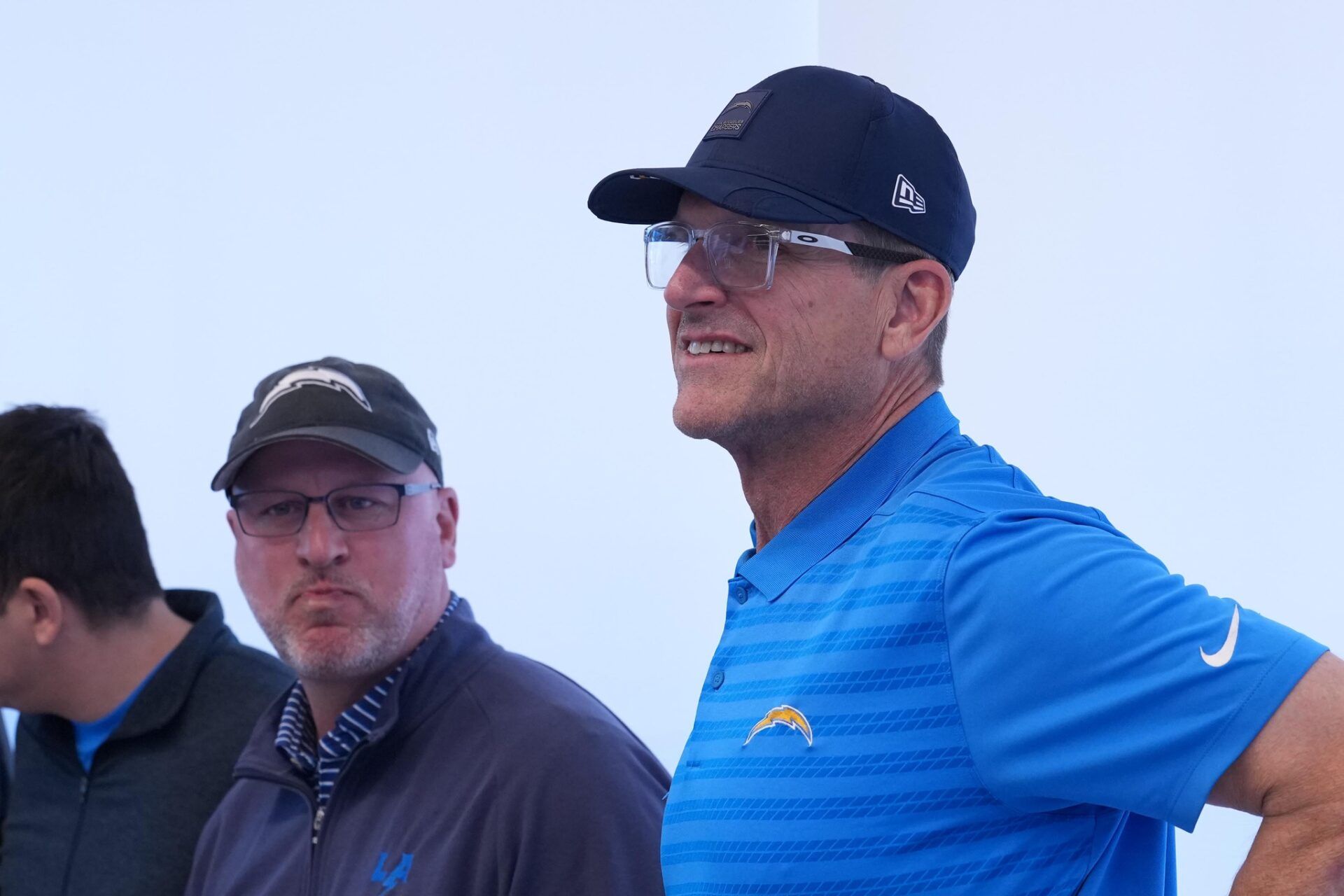 Los Angeles Chargers coach Jim Harbaugh (right) and general manager Joe Hortiz attend introductory press conference for offensive coordinator Mike McDaniel at The Bolt.