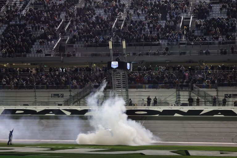 O’Reilly Auto Parts Series driver Austin Hill (21) does a burnout after winning the United Rentals 300 at Daytona International Speedway.