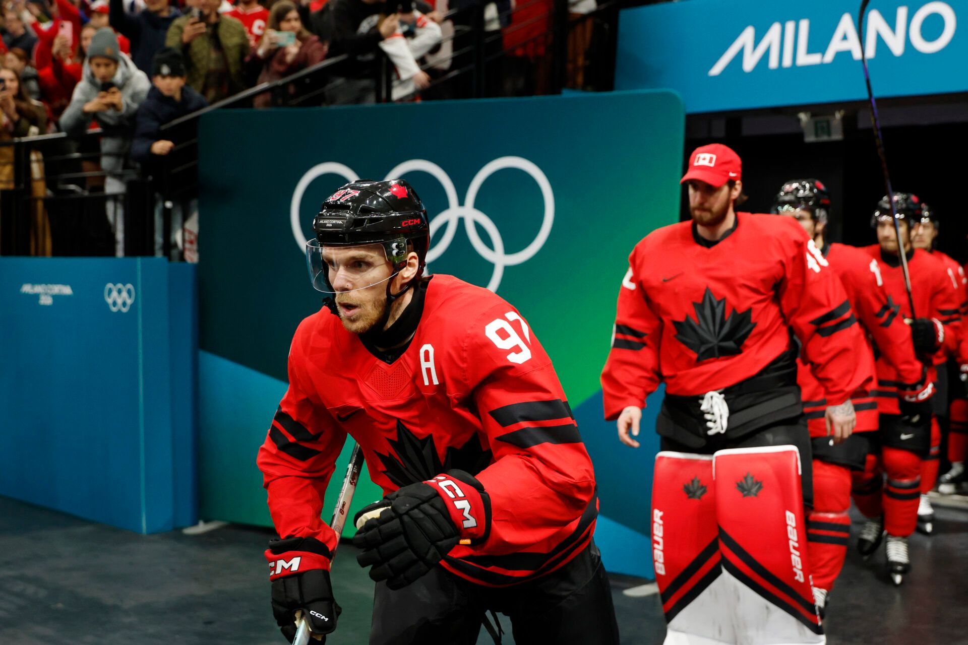 Connor McDavid of Canada walks out to the ice before a men's ice hockey quarterfinal during the Milano Cortina 2026 Olympic Winter Games at Milano Santagiulia Ice Hockey Arena.