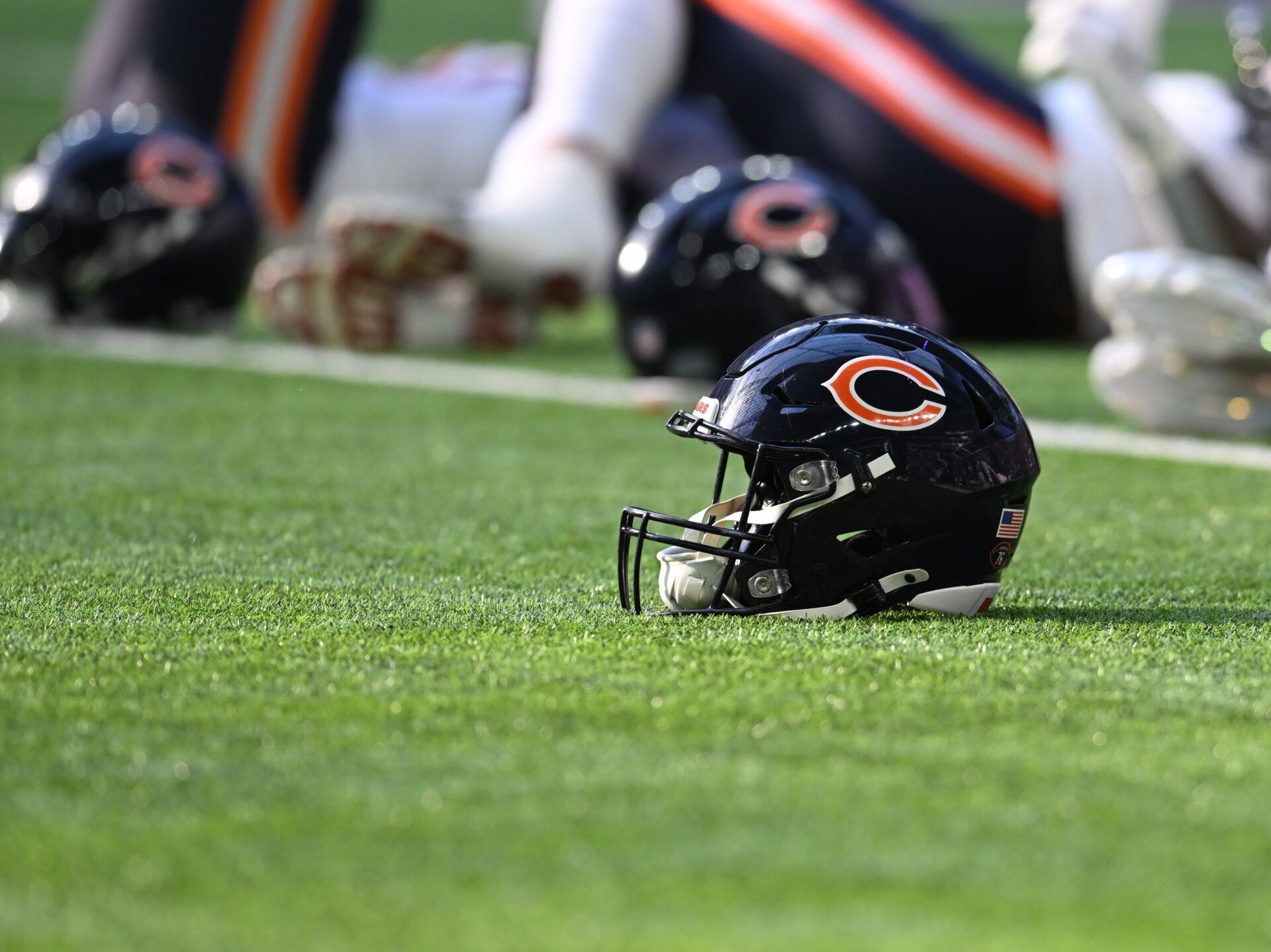 A Chicago Bears helmet sits on the field prior to a game against the Minnesota Vikings at U.S. Bank Stadium.