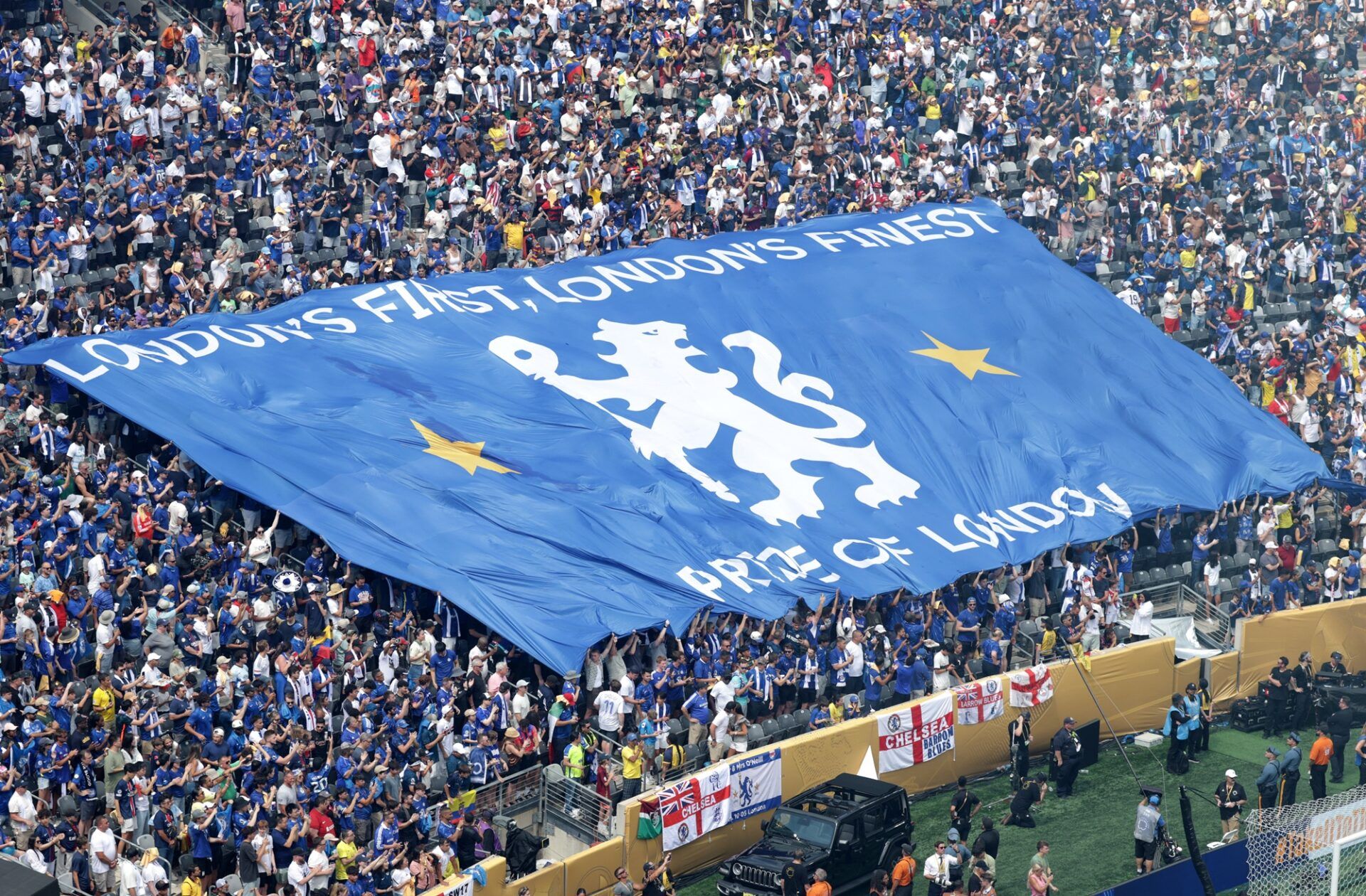 [Subscription Customers Only] Jul 13, 2025; East Rutherford, New Jersey, USA; Chelsea fans display a flag before the final of the 2025 FIFA Club World Cup at MetLife Stadium.