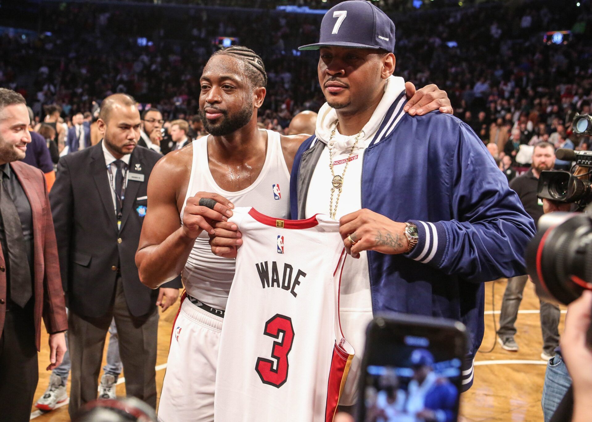 NBA former player Carmelo Anthony and Miami Heat guard Dwayne Wade (3) at Barclays Center.