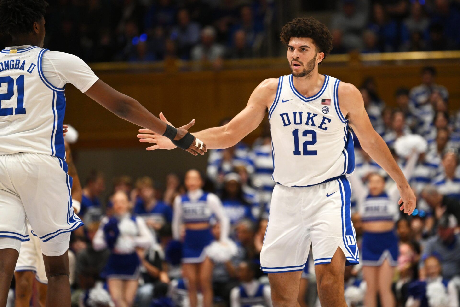 Duke Blue Devils forward Cameron Boozer (12) celebrates with Duke Blue Devils center Patrick Ngongba II (21) during the during the second half against the Syracuse Orange at Cameron Indoor Stadium.