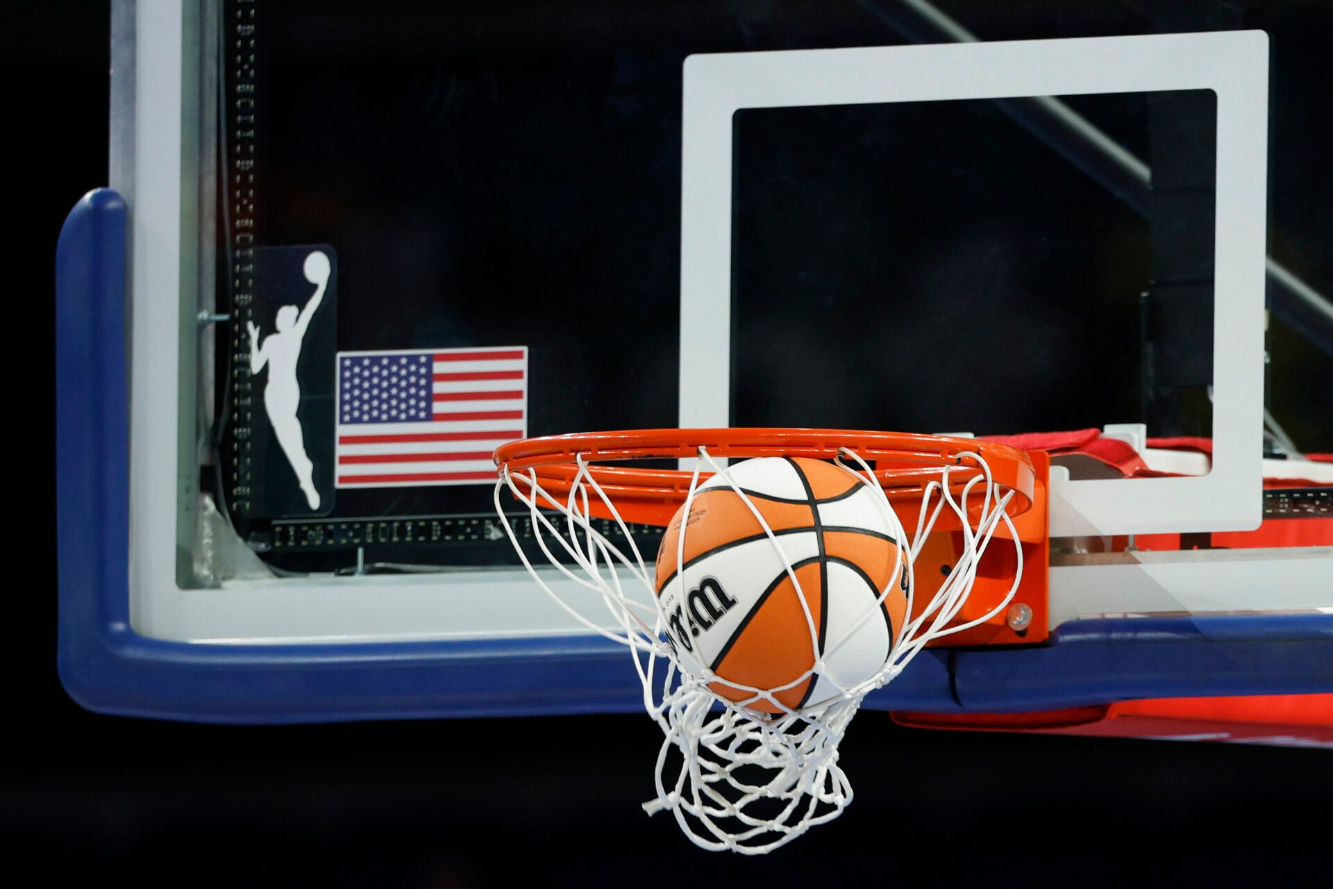 Wilson basketball is seen next to WNBA logo before a game between the Chicago Sky and Phoenix Mercury at Wintrust Arena.